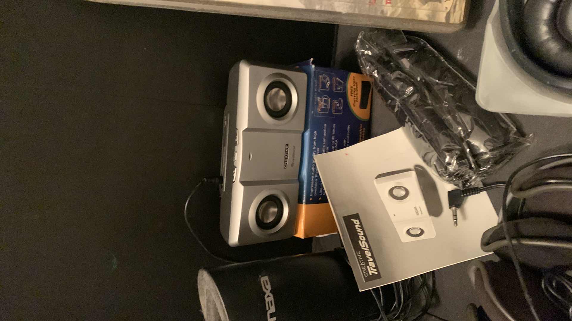 Photo 1 of ELECTRONICS ASSORTMENT, FLASHLIGHT RADIO, WIRELESS HEADPHONES, TRAVEL SOUND AND MORE