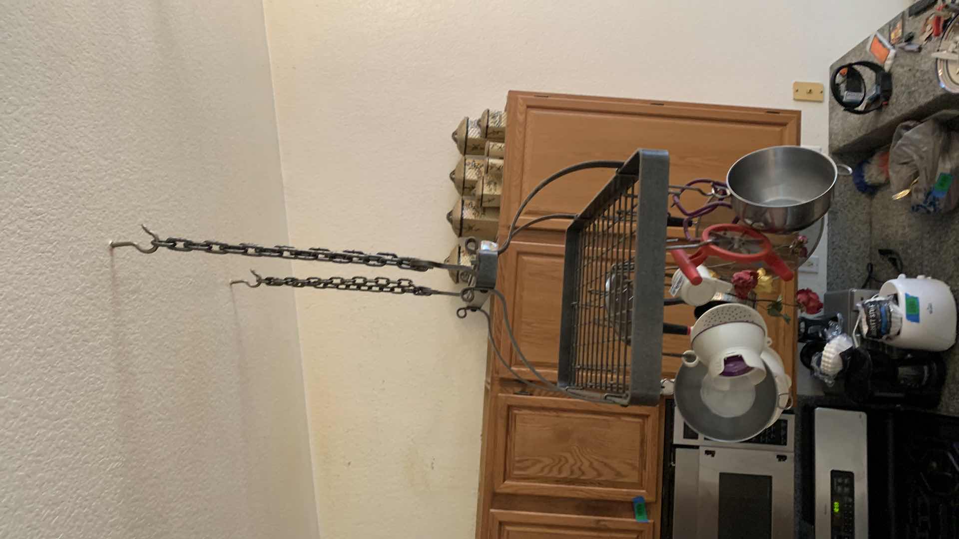 Photo 1 of HEAVY METAL HANGING POT RACK W ITEMS AND CANISTER SET (NOTE: BUYER TO REMOVE)