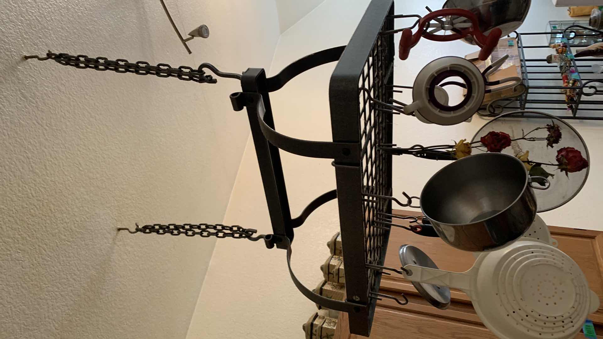 Photo 1 of HEAVY METAL HANGING POT RACK W ITEMS AND CANISTER SET (NOTE: BUYER TO REMOVE)