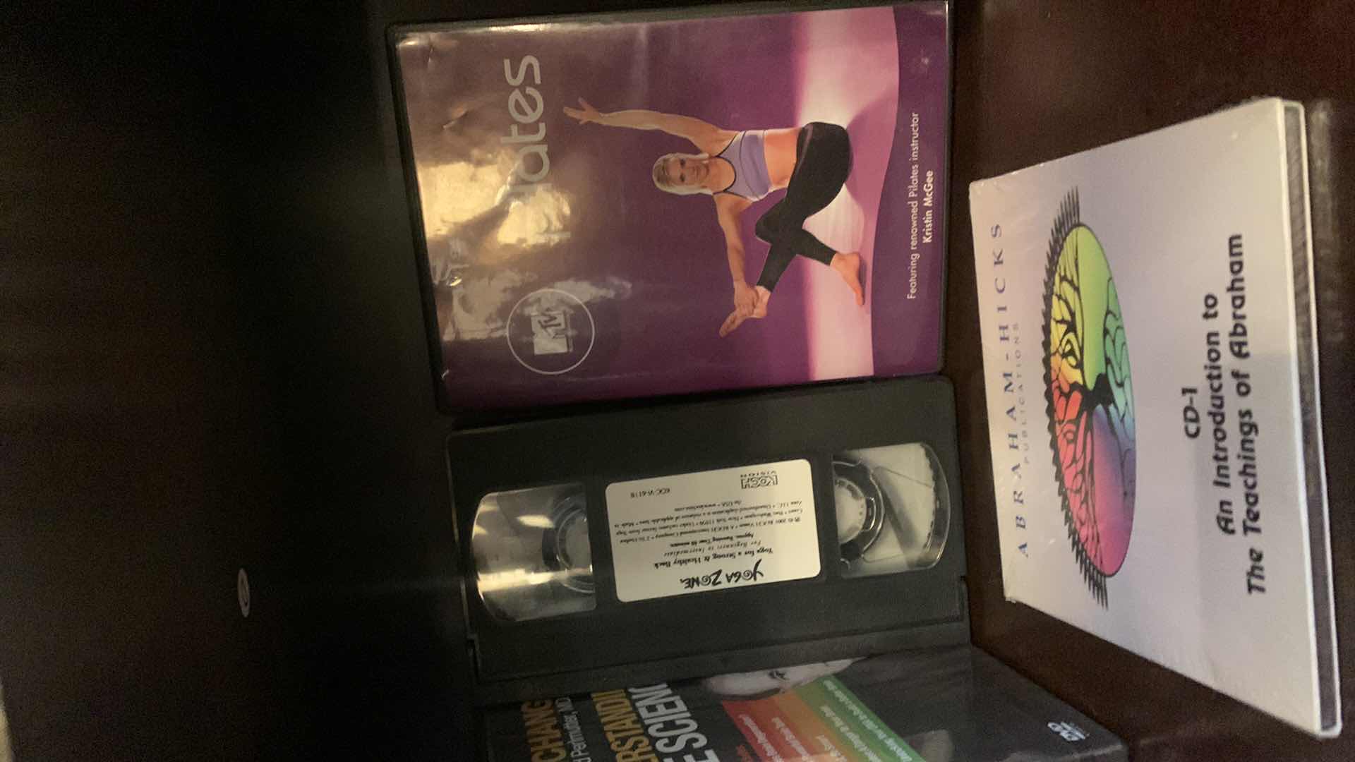 Photo 1 of DVDS CDS AND VHS TAPES