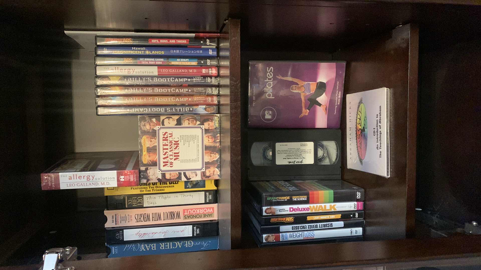 Photo 1 of DVDS CDS AND VHS TAPES