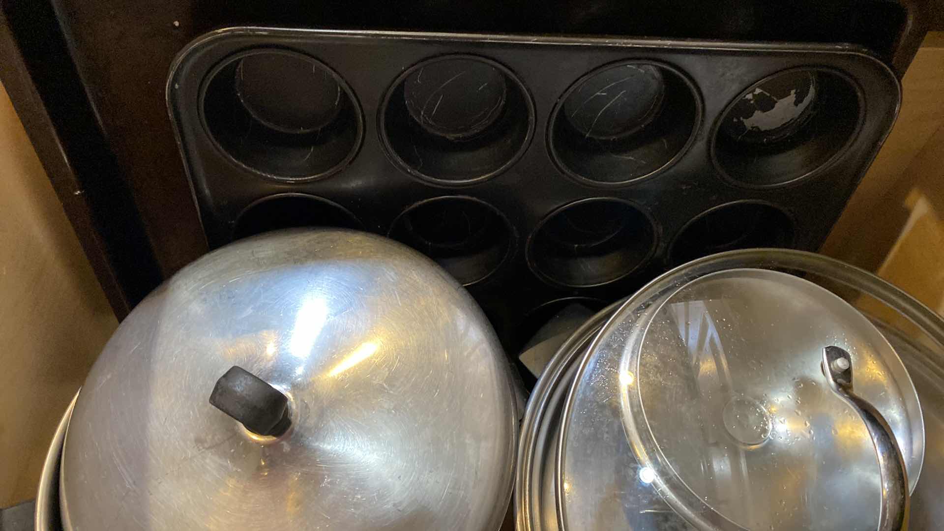 Photo 1 of CONTENTS OF DRAWER POTS AND PANS