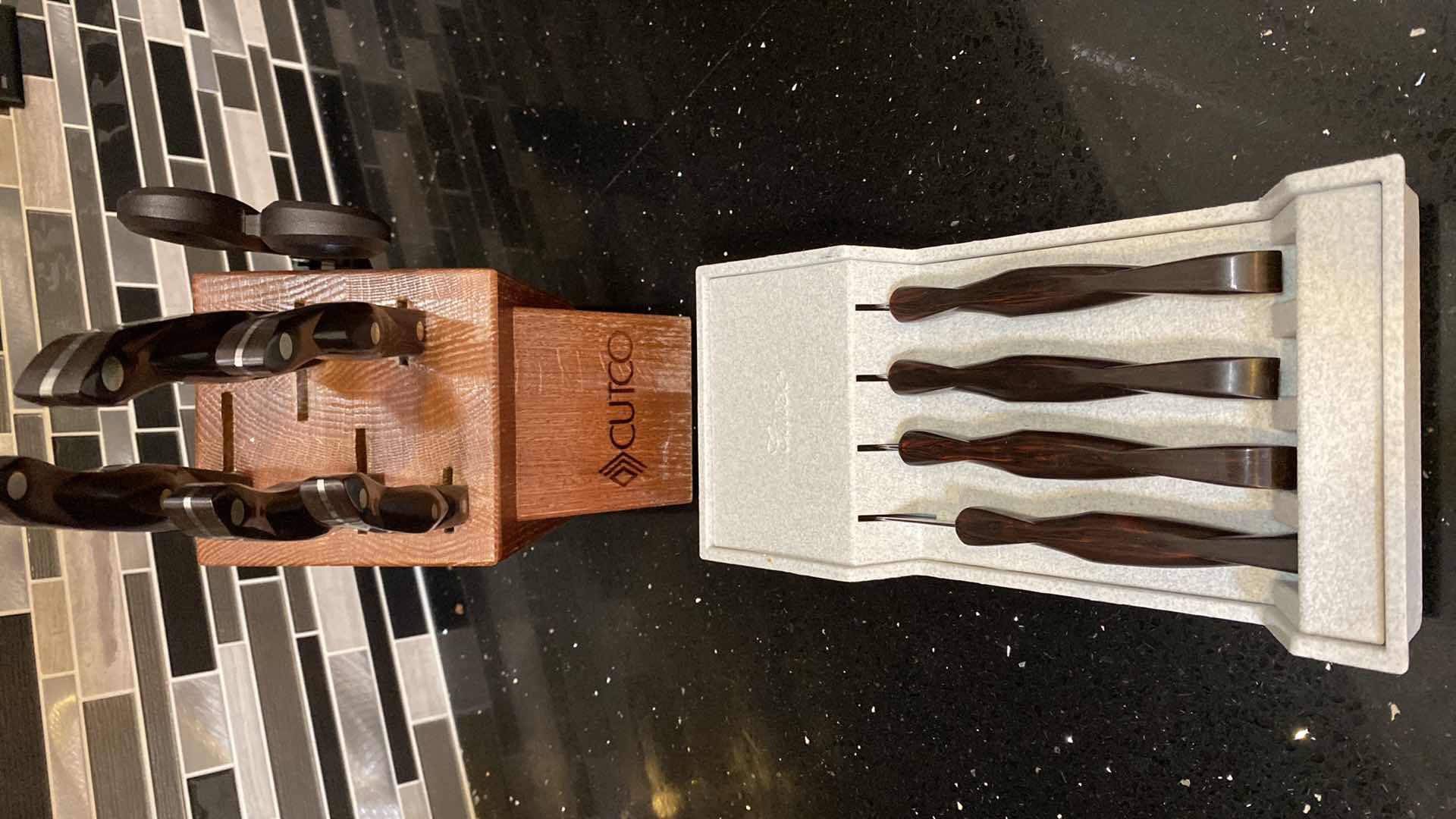Photo 1 of CUTCO KNIFE SET IN BLOCK AND 4 CUTCO STEAK KNIVES