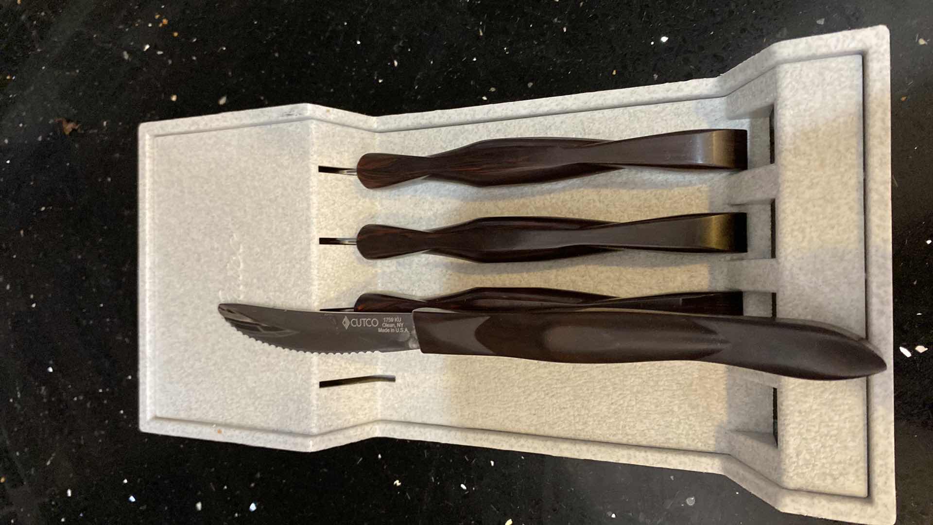 Photo 1 of CUTCO KNIFE SET IN BLOCK AND 4 CUTCO STEAK KNIVES