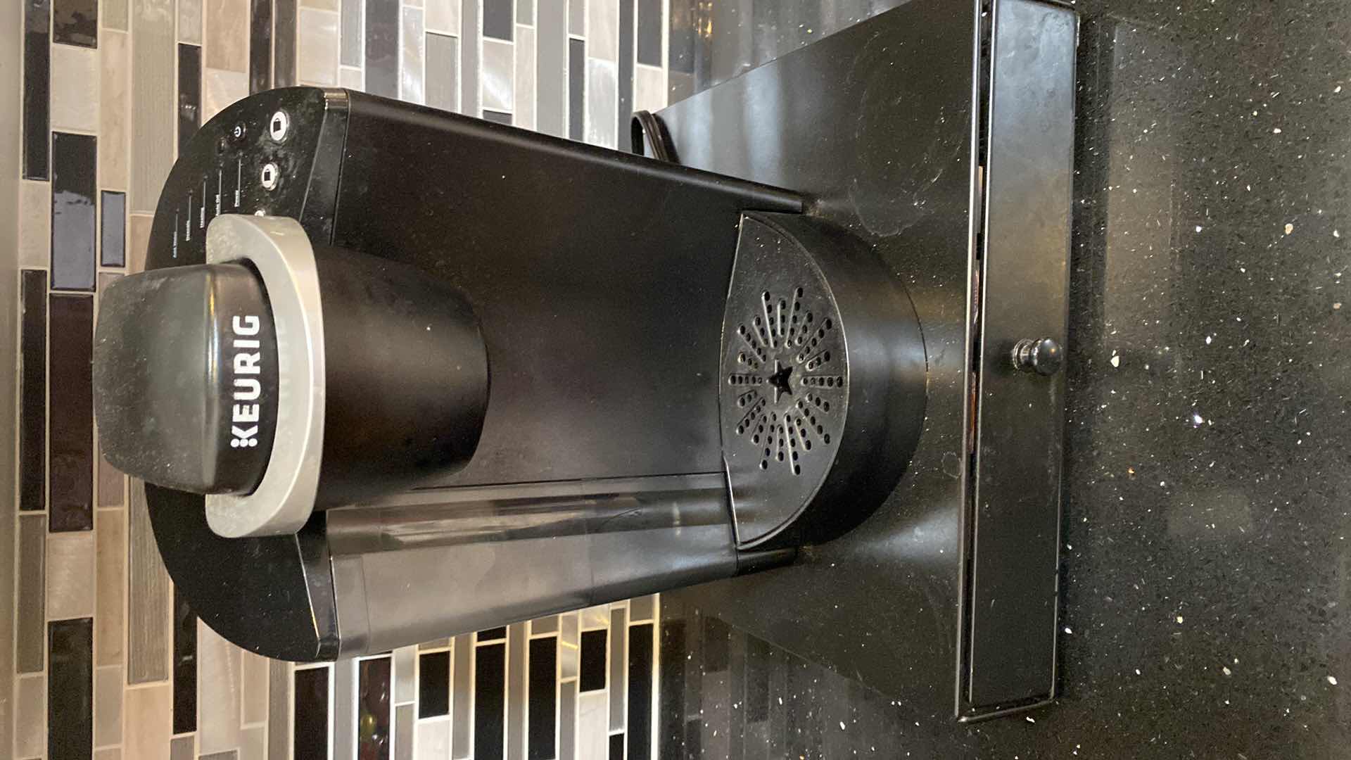 Photo 1 of KEURIG COFFEE MAKER WITH POD STORAGE AND PODS