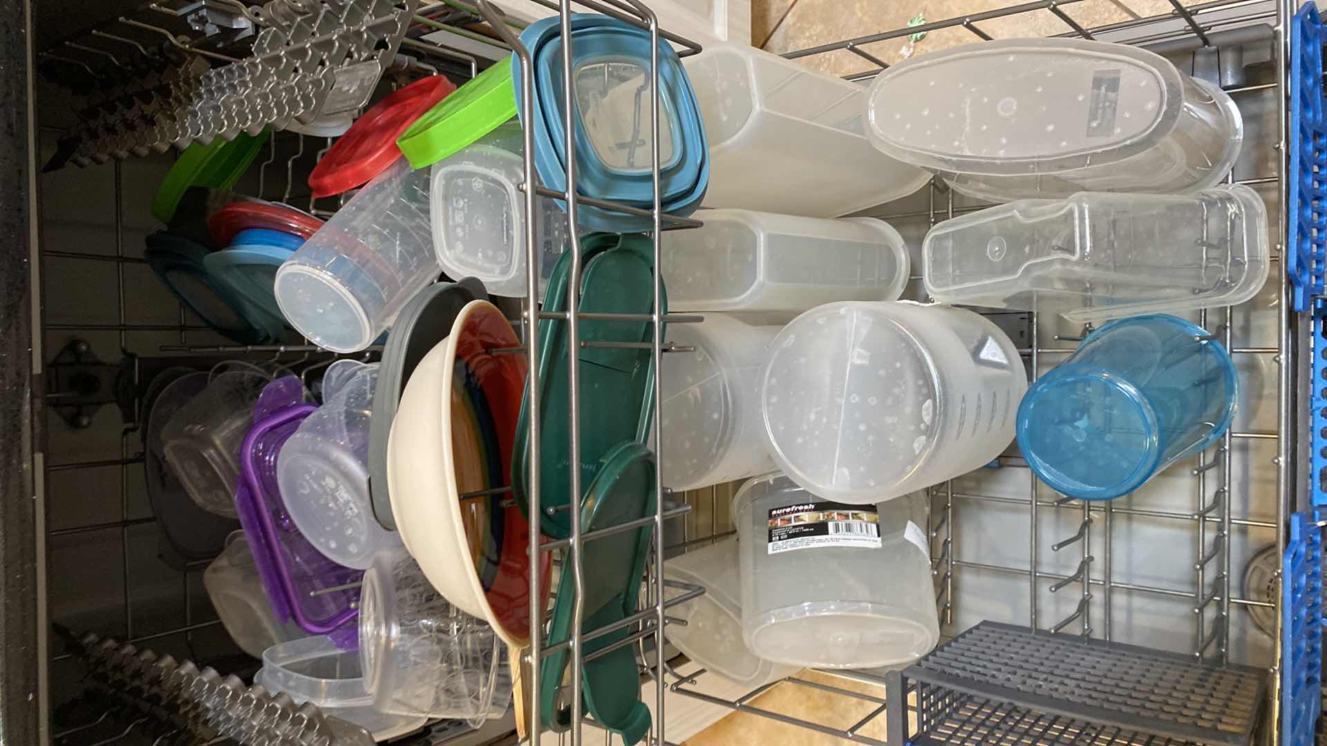 Photo 1 of CONTENTS OF DISHWASHER