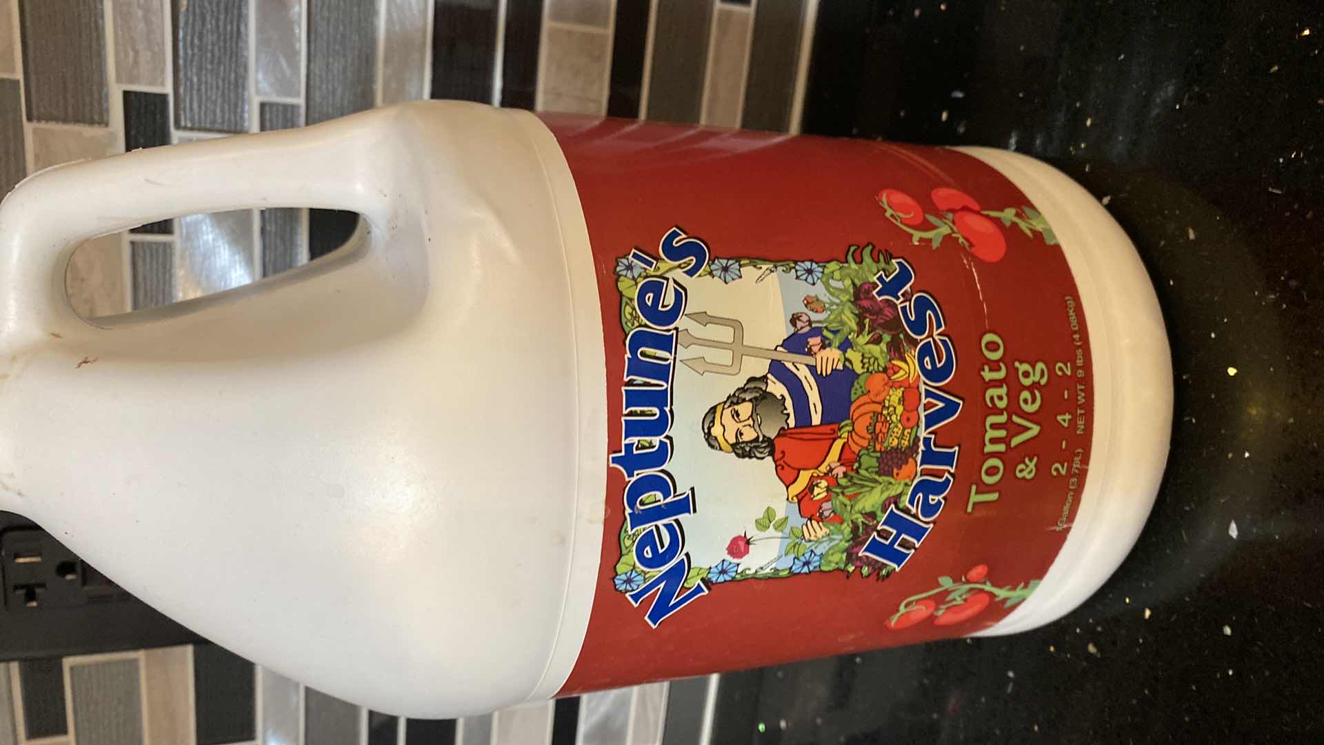 Photo 3 of GARDENING TOOLS AND NEPTUNES HARVEST FERTILIZER