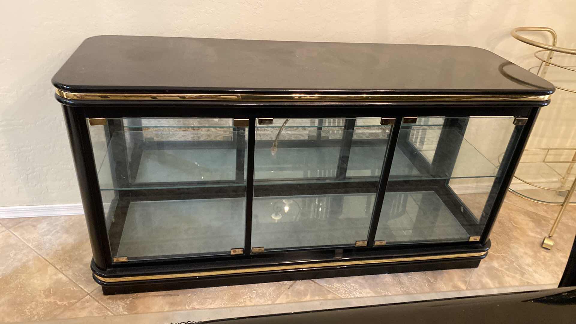 Photo 1 of BLACK LACQUER AND GLASS SIDEBOARD 56” X 18” H29