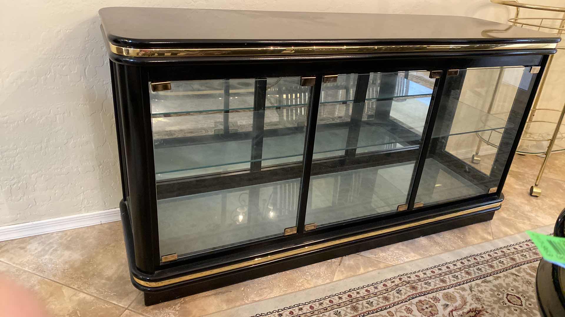 Photo 1 of BLACK LACQUER AND GLASS SIDEBOARD 56” X 18” H29