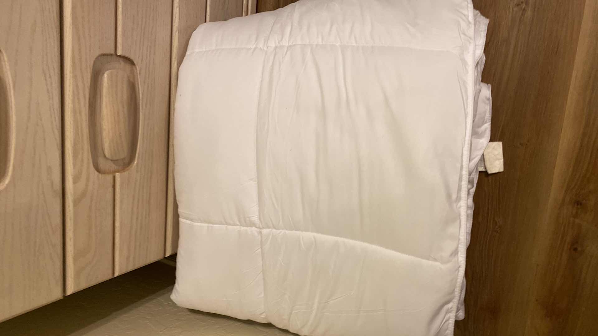 Photo 1 of QUEEN COMFORTER AND ASSORTED 3 PILLOWS