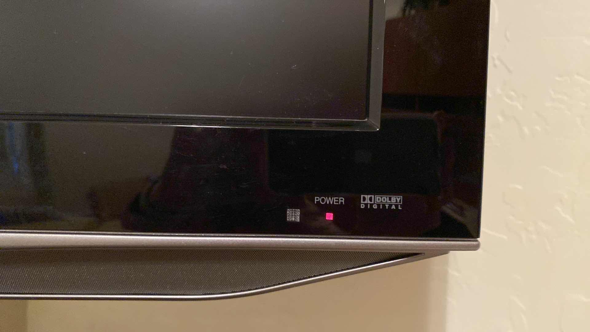 View 2 of SHARP TV 31” WITH REMOTE POWERS ON INCLUDES WALL BRACKET AND GE SPEAKER