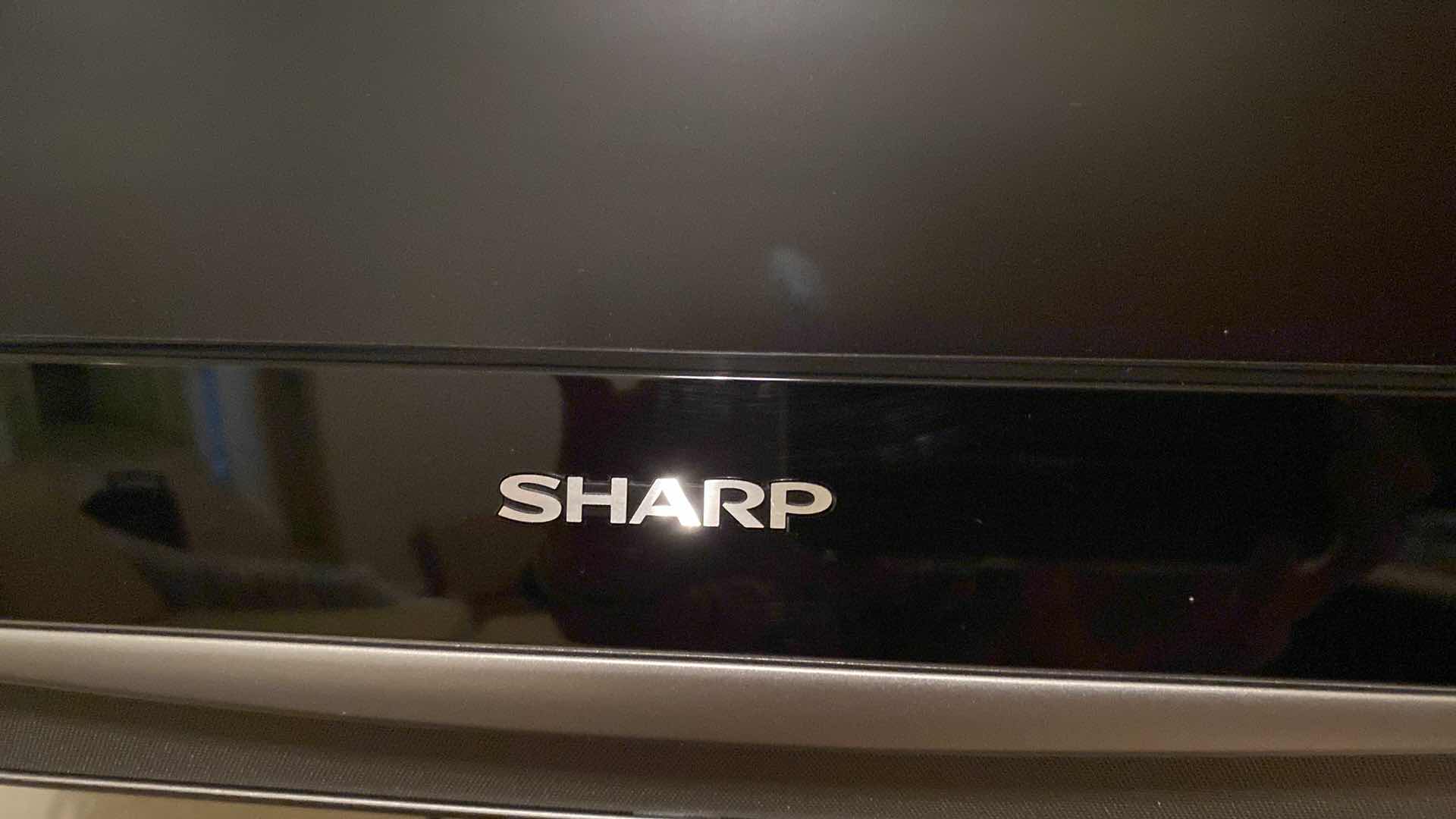 View 3 of SHARP TV 31” WITH REMOTE POWERS ON INCLUDES WALL BRACKET AND GE SPEAKER