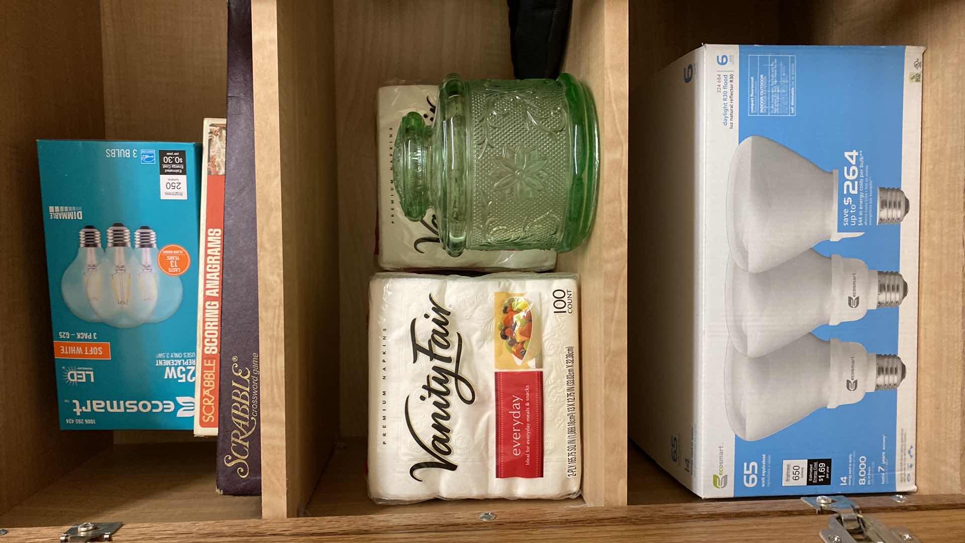 Photo 1 of CONTENTS OF CABINET GAMES, BULBS NAPKINS