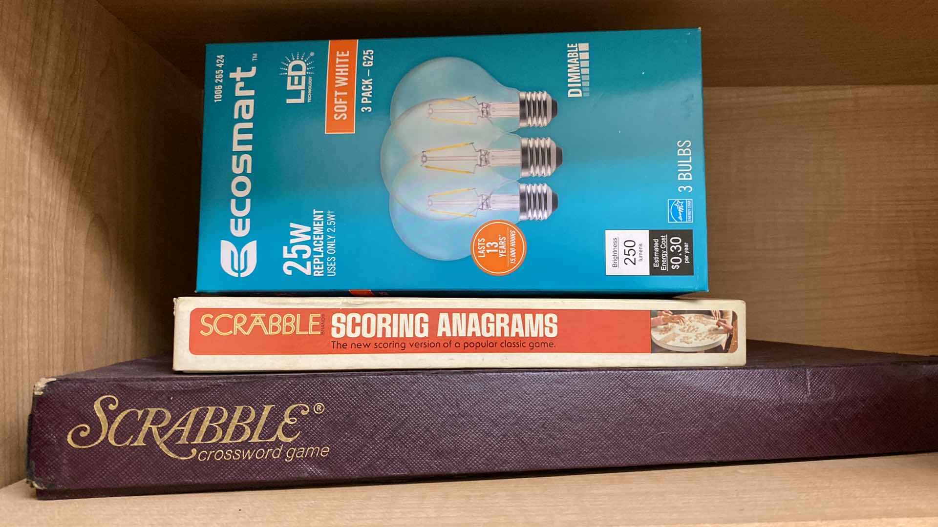 Photo 1 of CONTENTS OF CABINET GAMES, BULBS NAPKINS