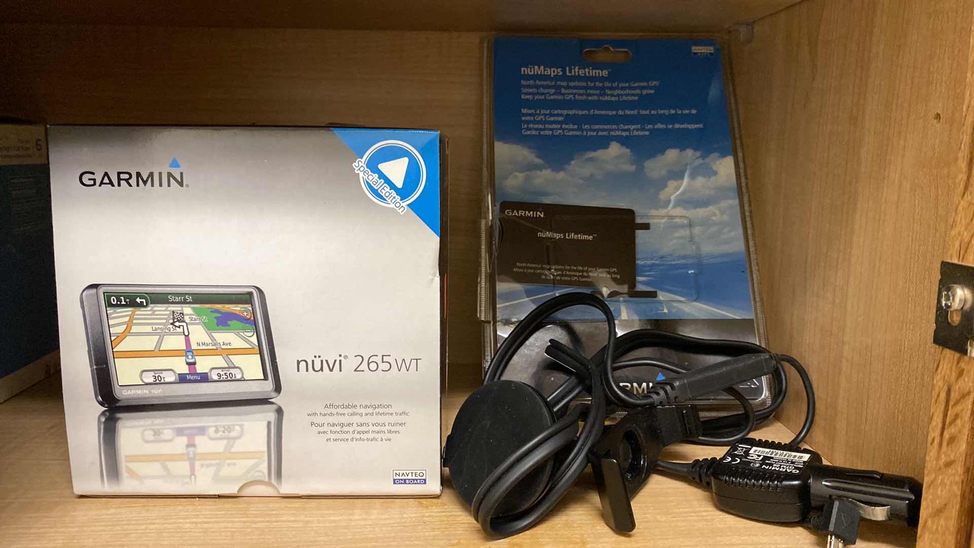 Photo 1 of CONTENTS OF CABINET IRONS, GARMIN AND MORE