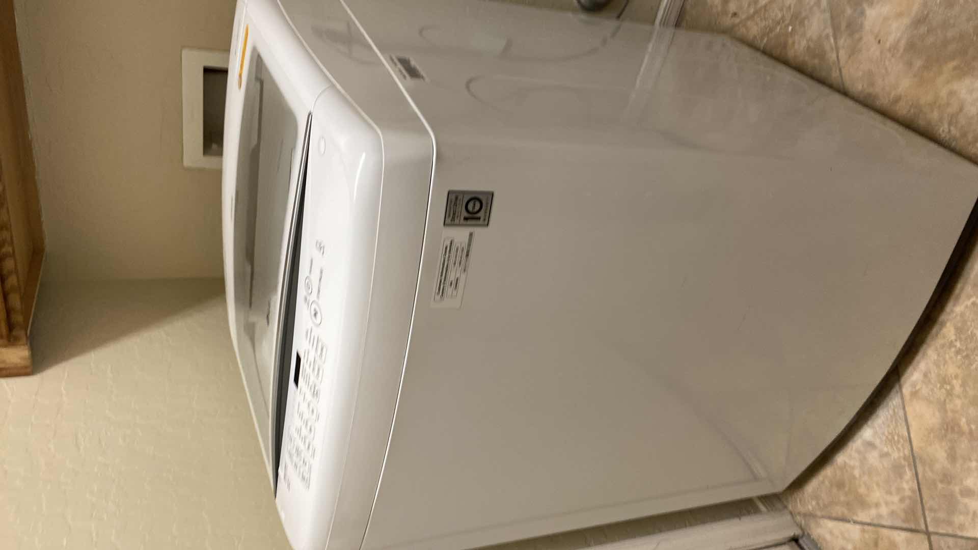 Photo 1 of LG TOP LOADER WASHING MACHINE MODEL WT1501CW (MATCHING GAS DRYER AVAILABLE SEPARATELY)