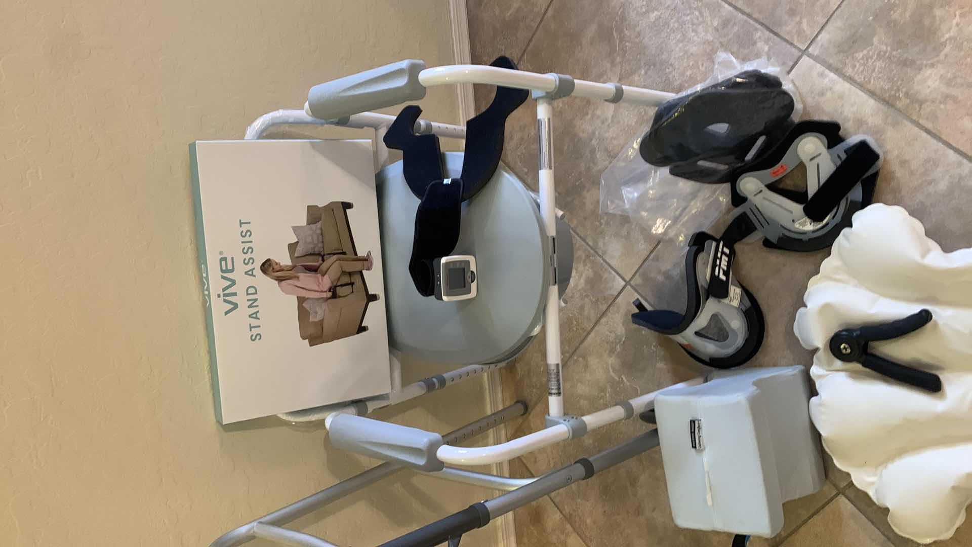 Photo 1 of MEDICAL SUPPLIES - WALKER, POTTY SEAT, STAND ASSIST AND MORE