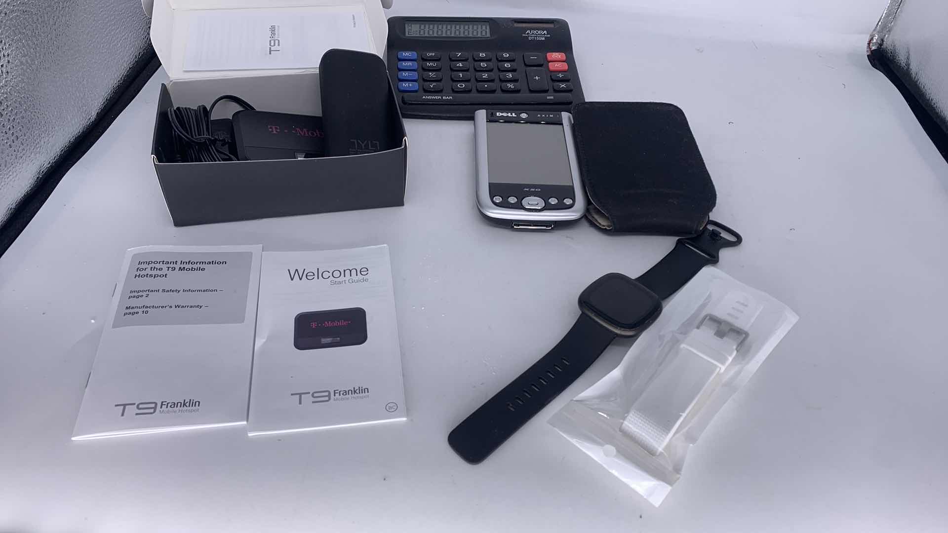 Photo 5 of MISC ELECTRONICS ASSORTMENT, FIT BIT AND CALCULATOR