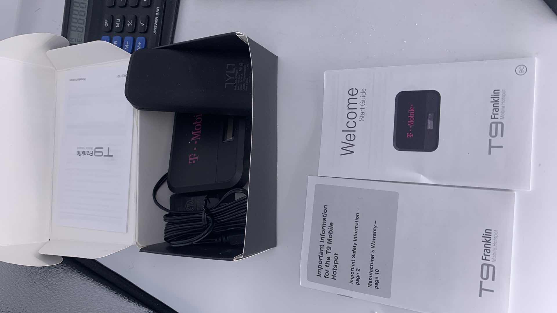 Photo 1 of MISC ELECTRONICS ASSORTMENT, FIT BIT AND CALCULATOR