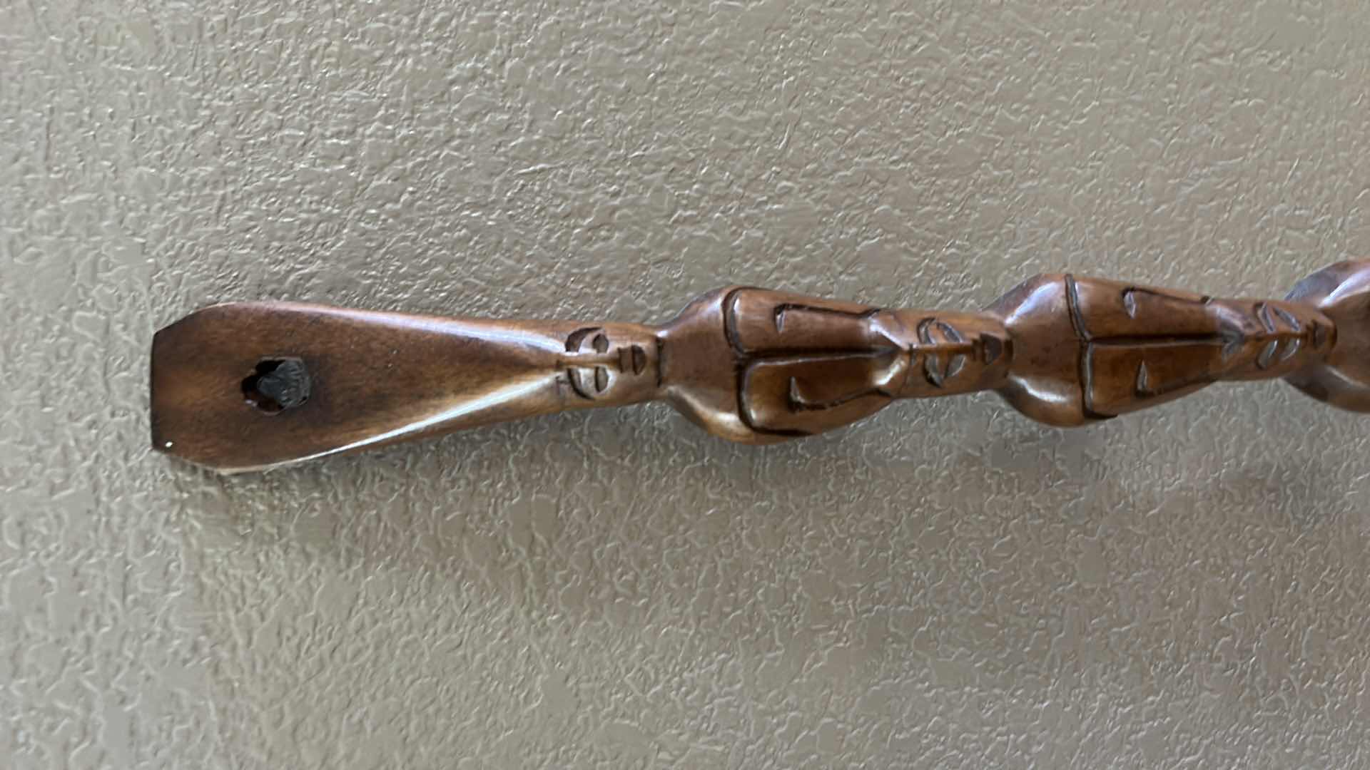 Photo 1 of TWO LARGE WOODEN UTENSILS H41”