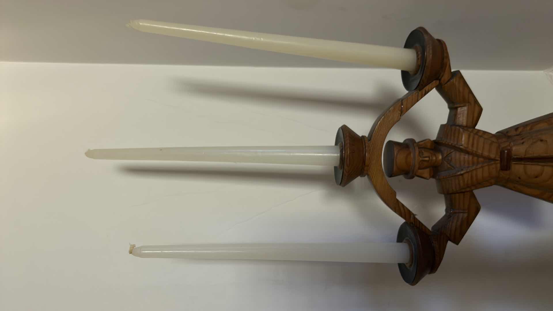 Photo 1 of TWO WOOD CANDLE HOLDERS FIGURES H14” WITH 6 11” TAPER CANDLES