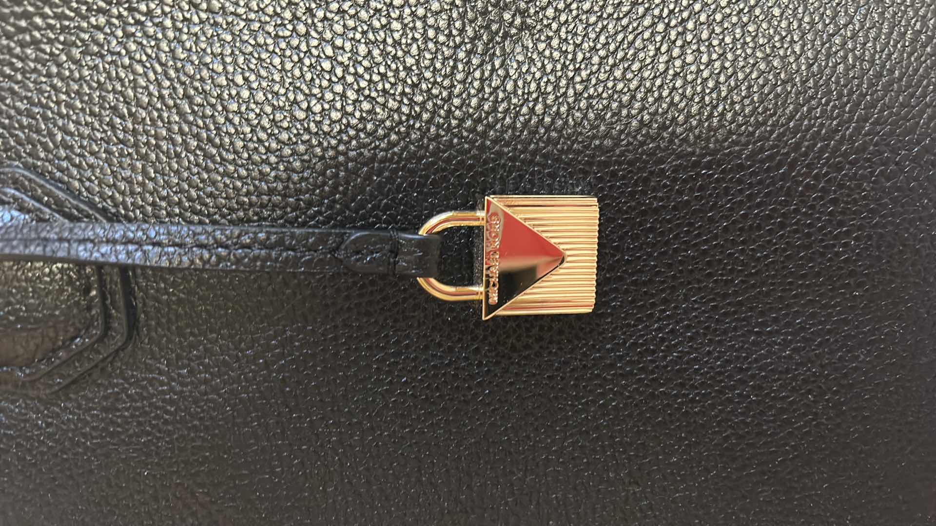 Photo 1 of NEW BLACK MICHAEL KORS PURSE W DUST BAG 12” x H10”