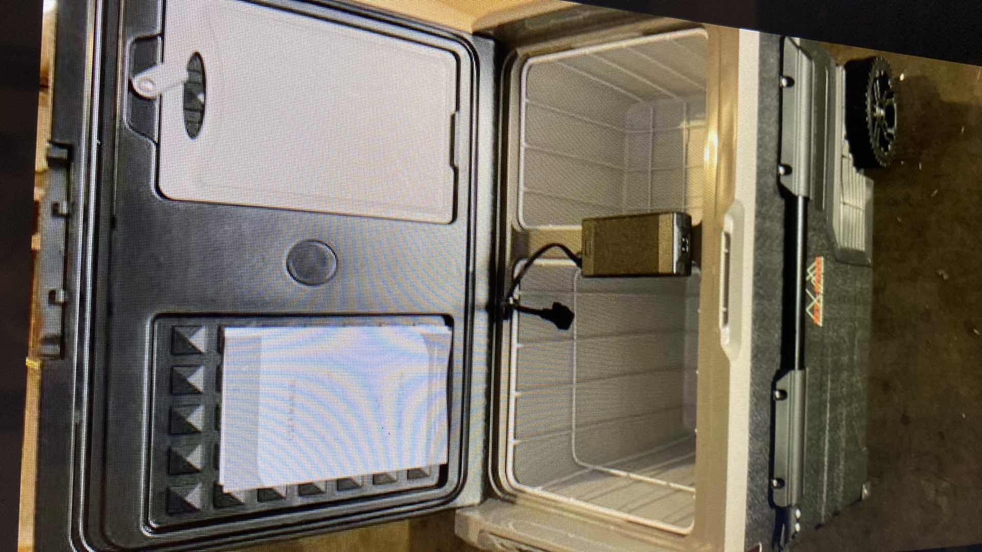 Photo 1 of DT PRO 59QT (55 LITER) PORTABLE 12 VOLT CAR/CAMPING  REFRIGERATOR FREEZER  SUG RETAIL