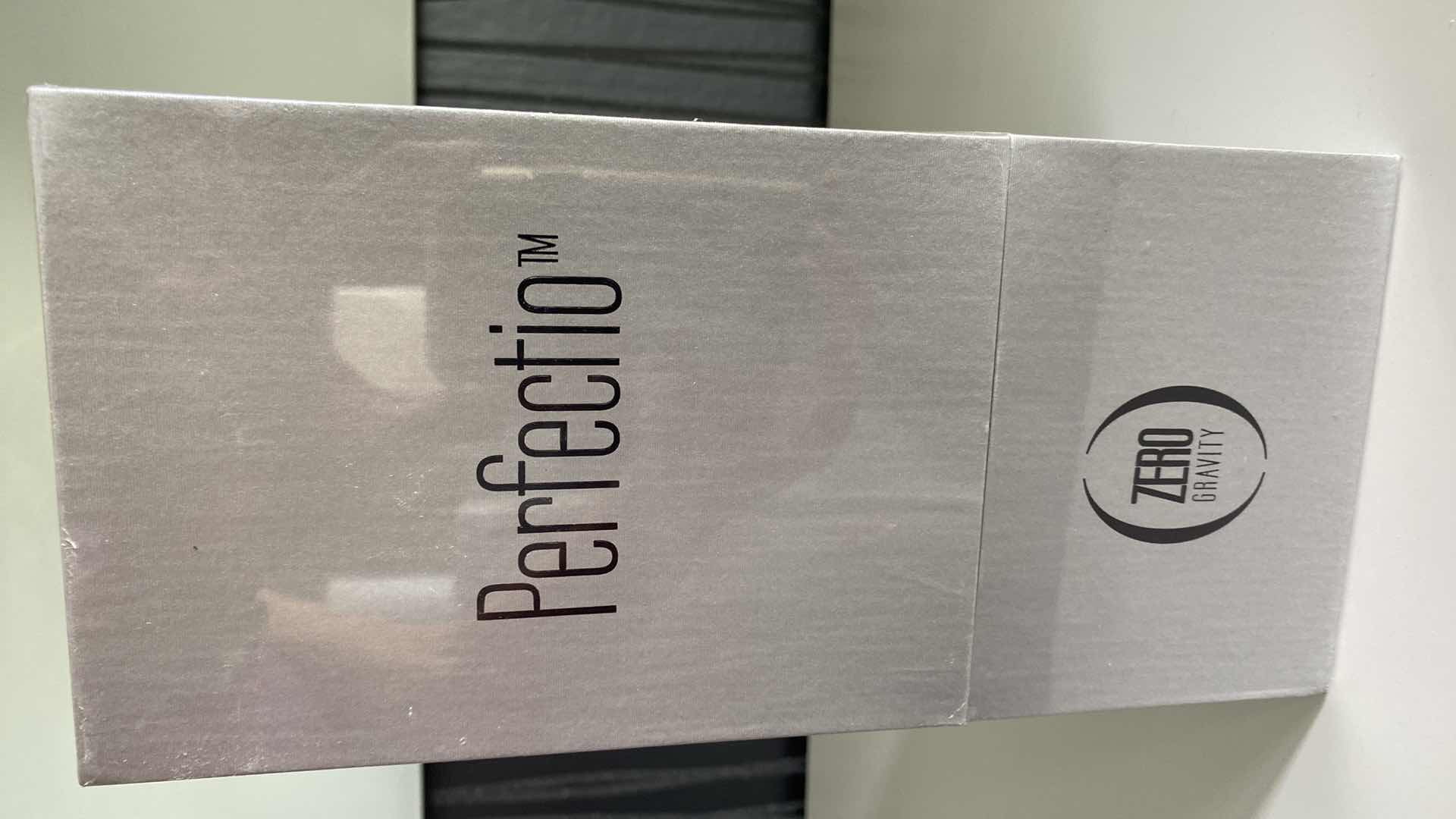 Photo 1 of PERFECTIO BY ZERO GRAVITY FACIAL DEVICE REJUVENATES SKINS APPEARANCE AND STRUCTURE USING DUAL ACTION TECHNIQUES RED LED LIGHT AND TOPICAL HEAT