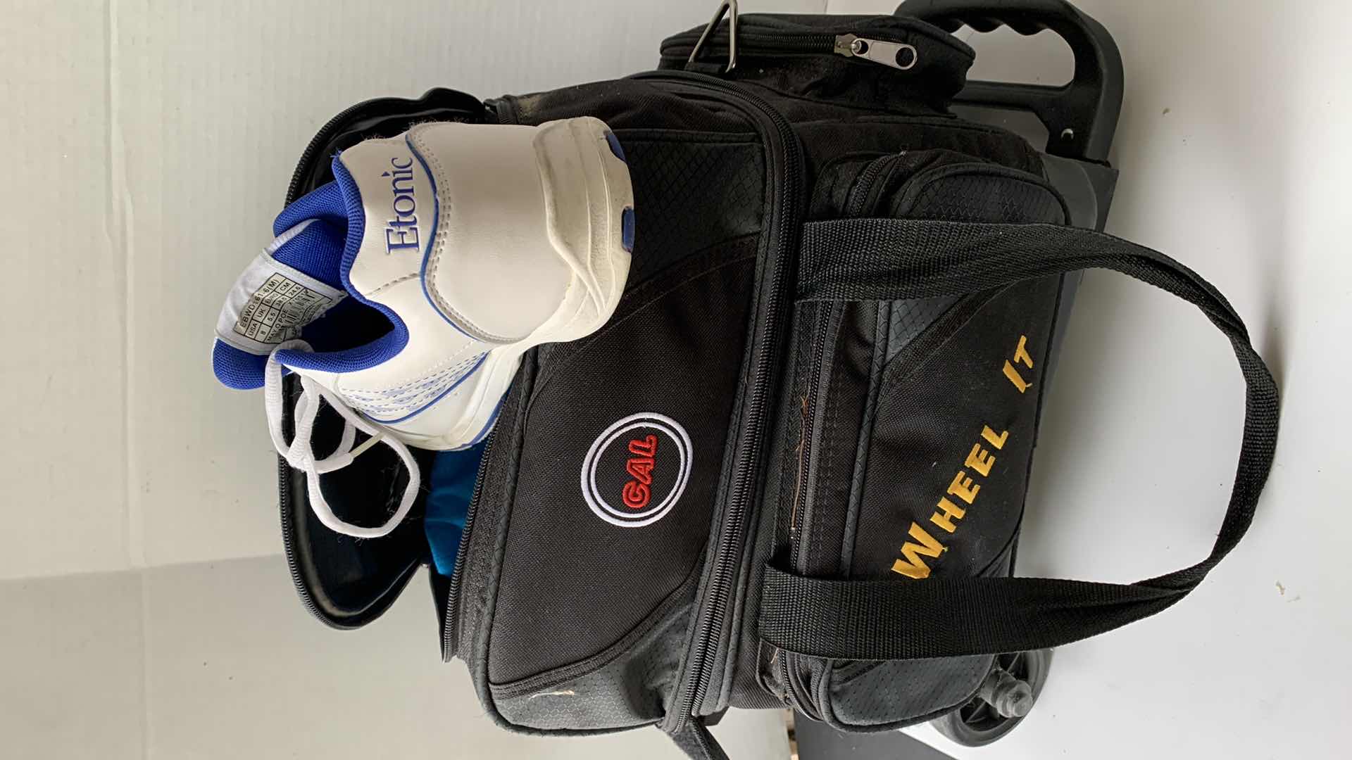 Photo 1 of BOWLING BALL AND WOMENS SHOES SIZE  8