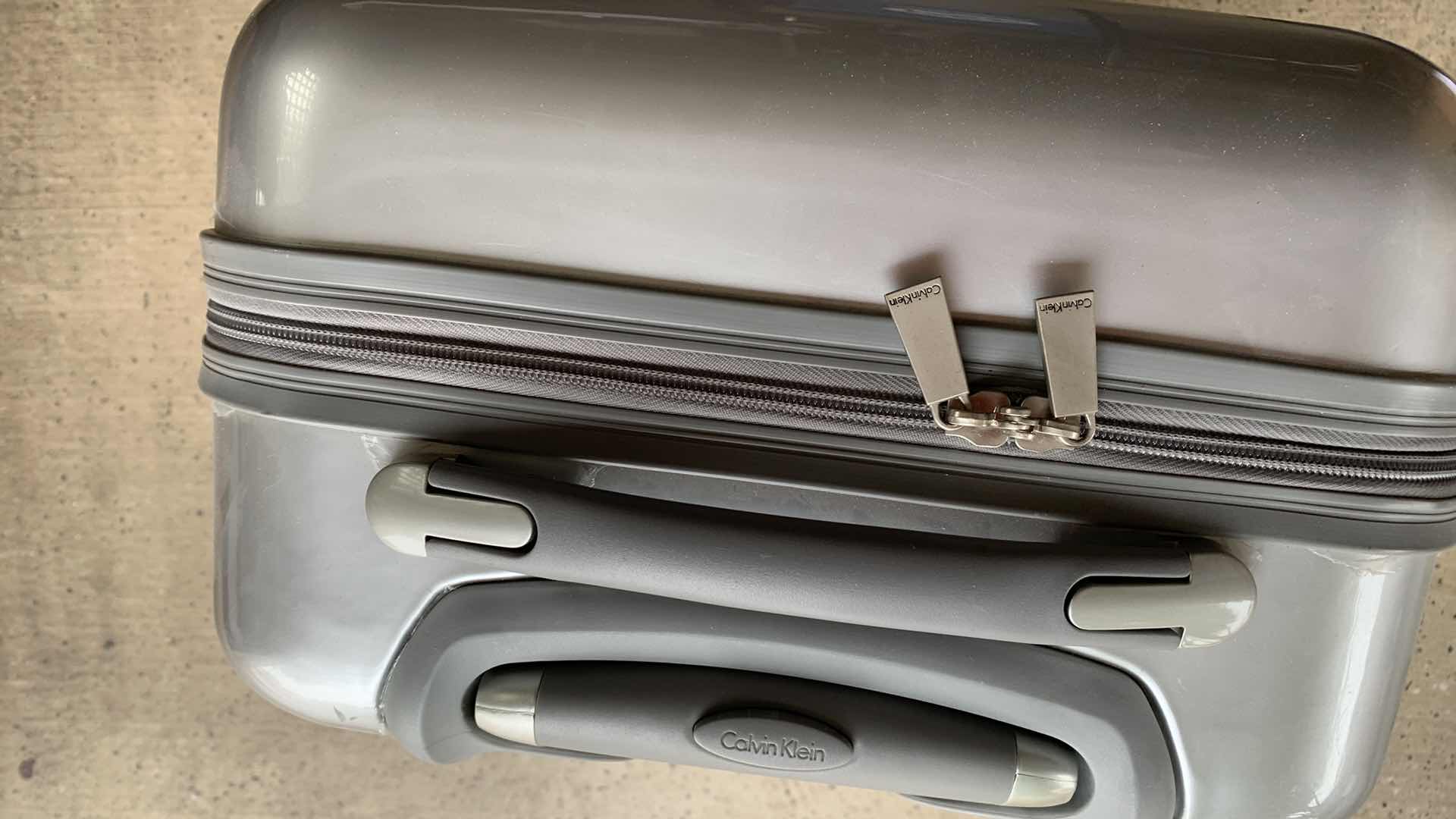 Photo 1 of CALVIN KLEIN HARD SIDE LUGGAGE 22”