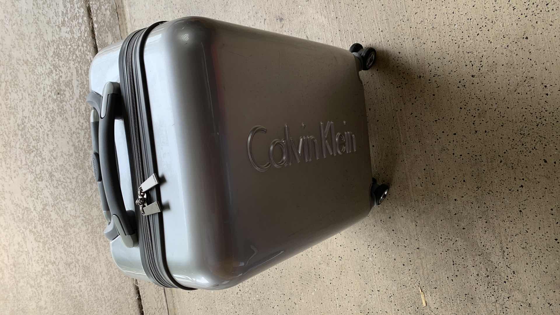 Photo 1 of CALVIN KLEIN HARD SIDE LUGGAGE 22”