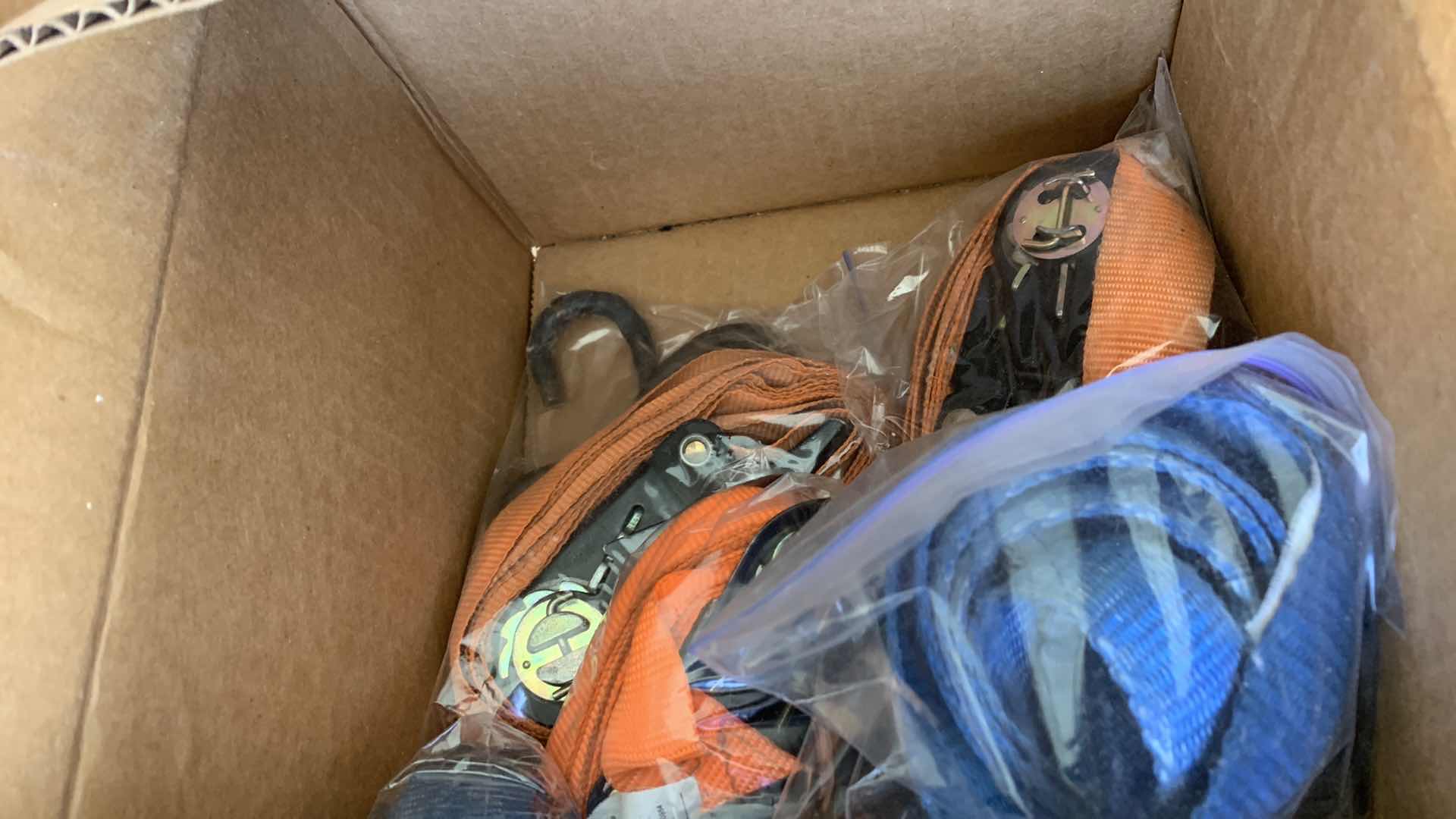 Photo 1 of MULTIPLE TIE DOWN STRAPS