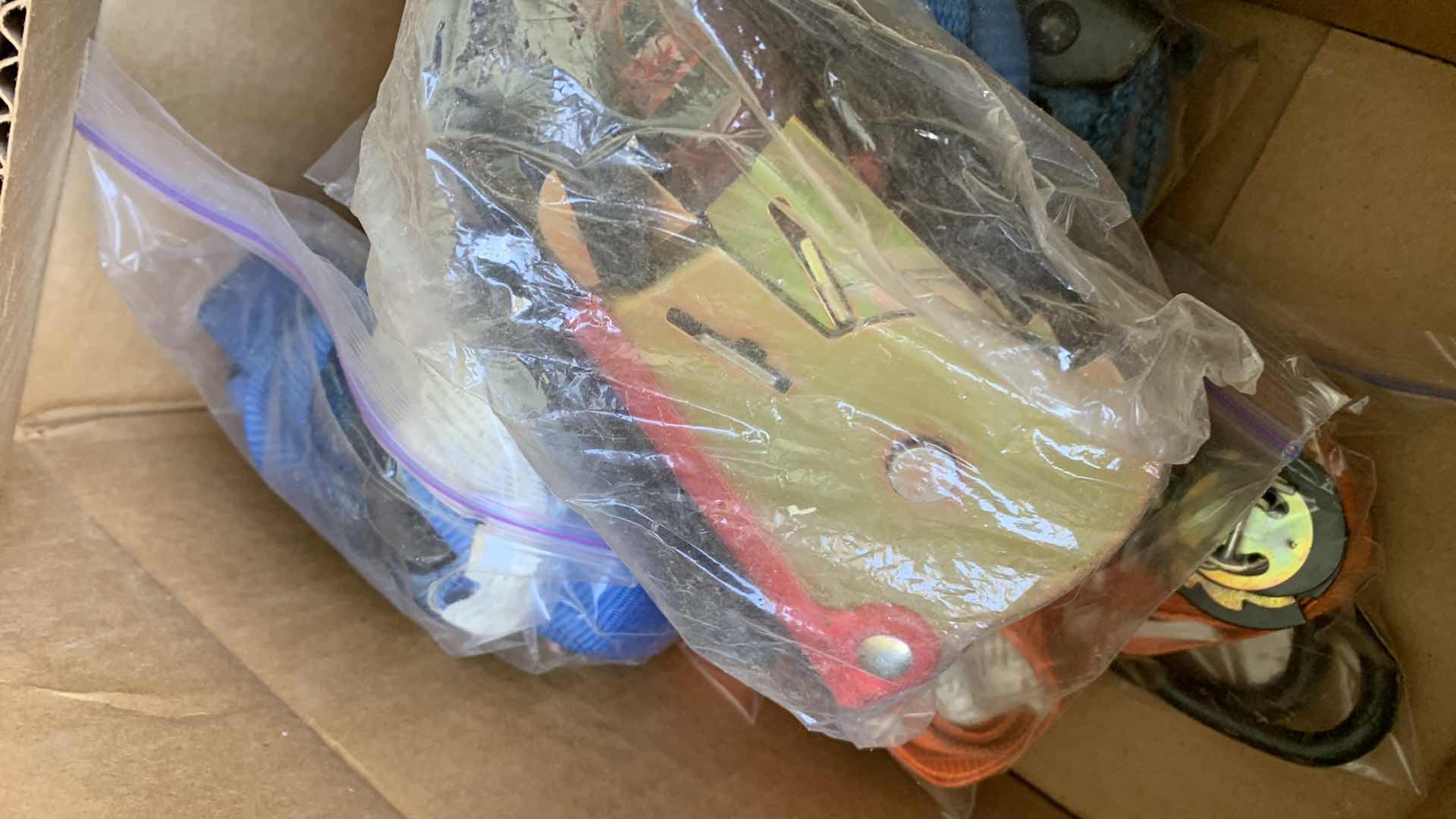 Photo 1 of MULTIPLE TIE DOWN STRAPS