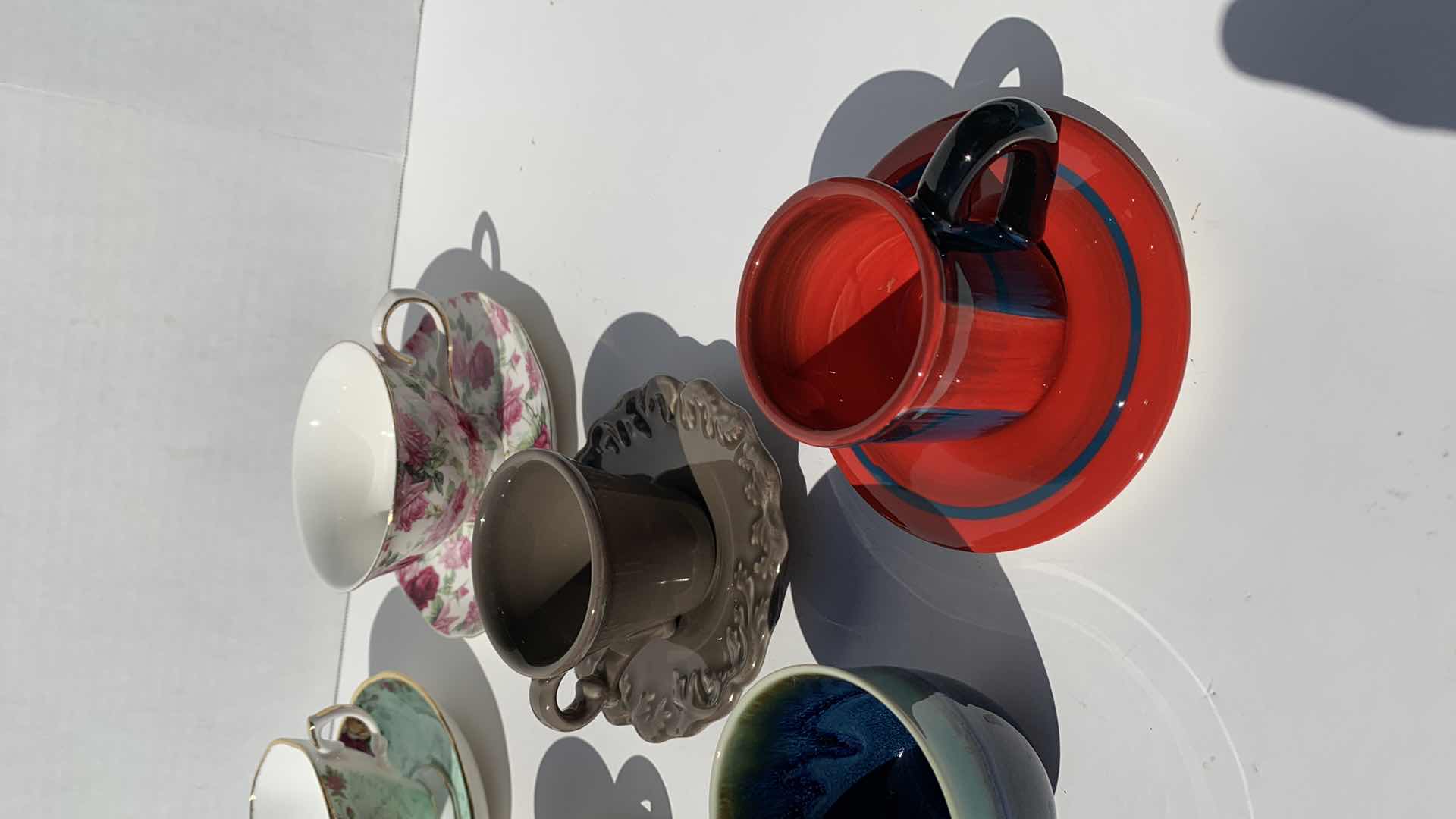 Photo 1 of ASSORTED TEA CUPS AND SAUCERS