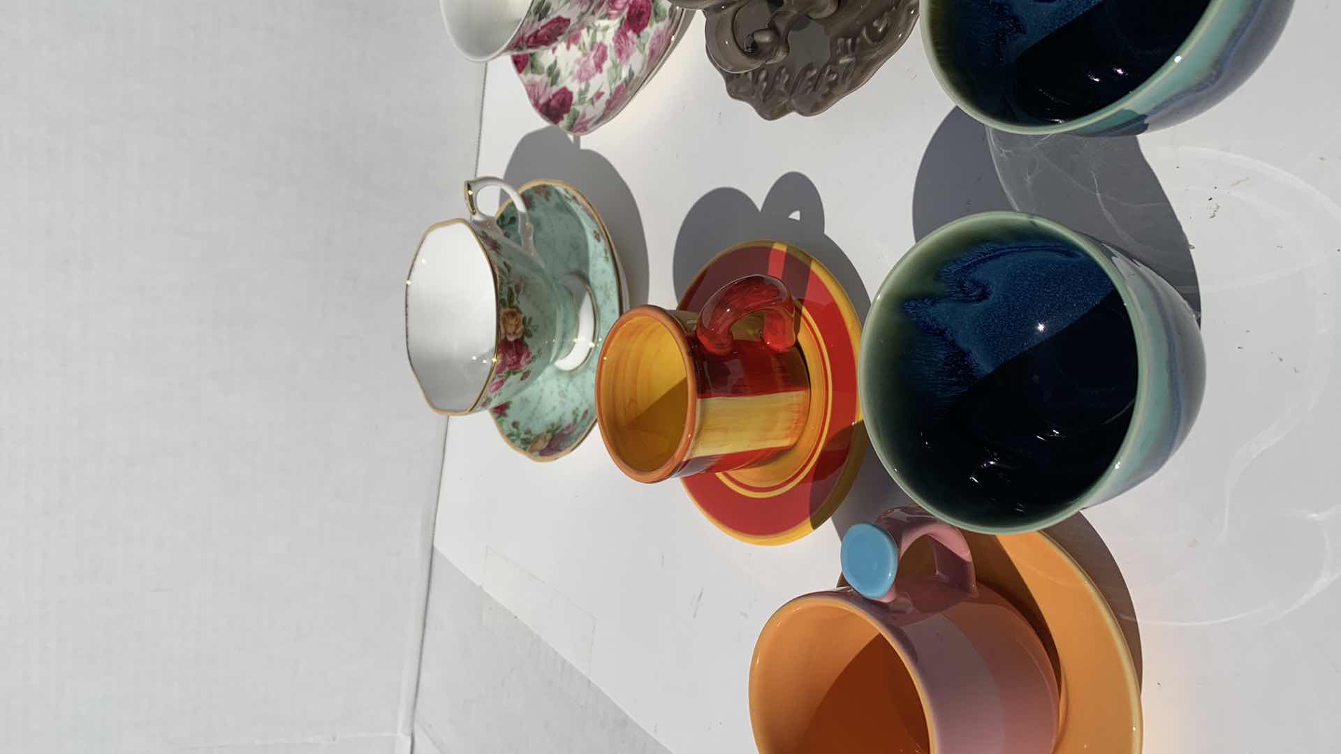 Photo 1 of ASSORTED TEA CUPS AND SAUCERS