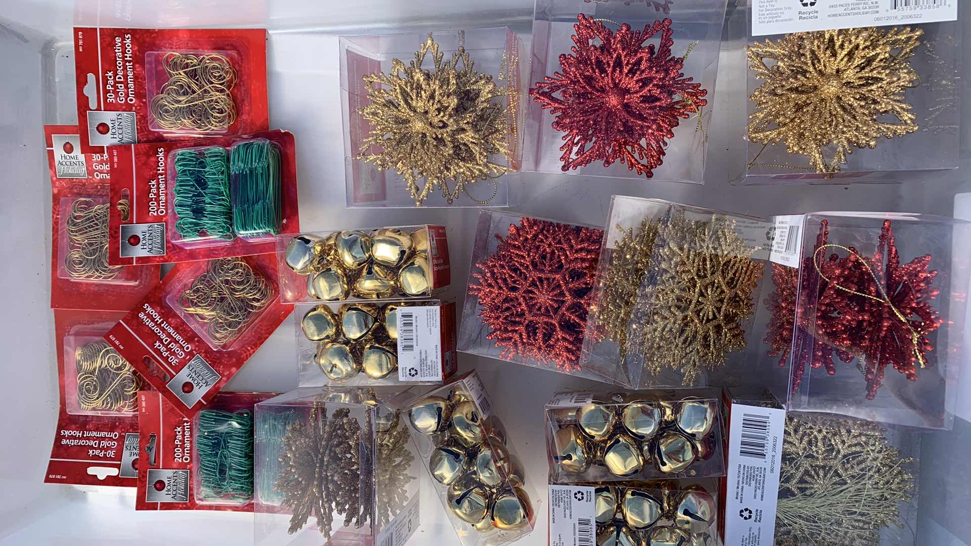 Photo 1 of CHRISTMAS DECORATIONS AND PKGS OF ORNAMENT HOOKS