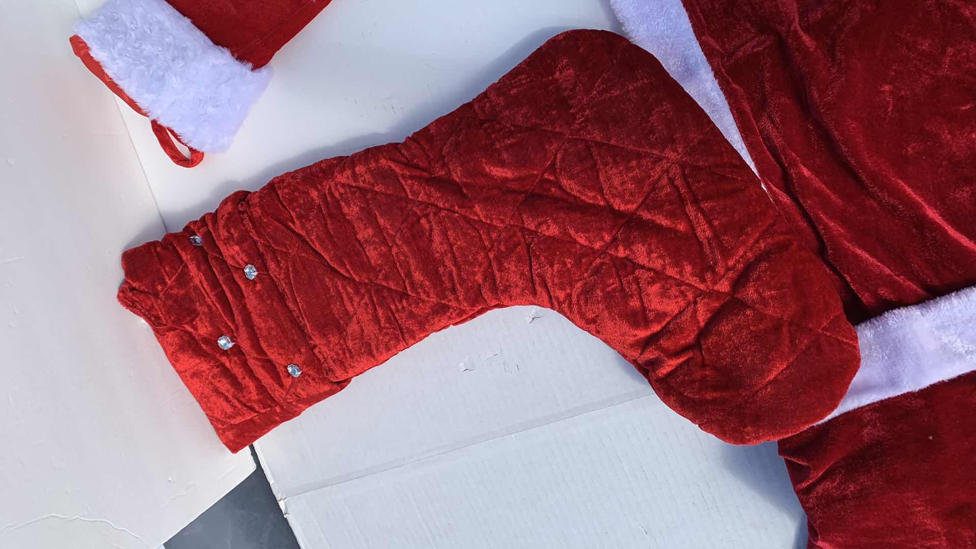 Photo 1 of CHRISTMAS DECORATIONS 2 TABLE RUNNERS, 5 QUILTED VELVET STOCKINGS, 2 SANTA BOOTS