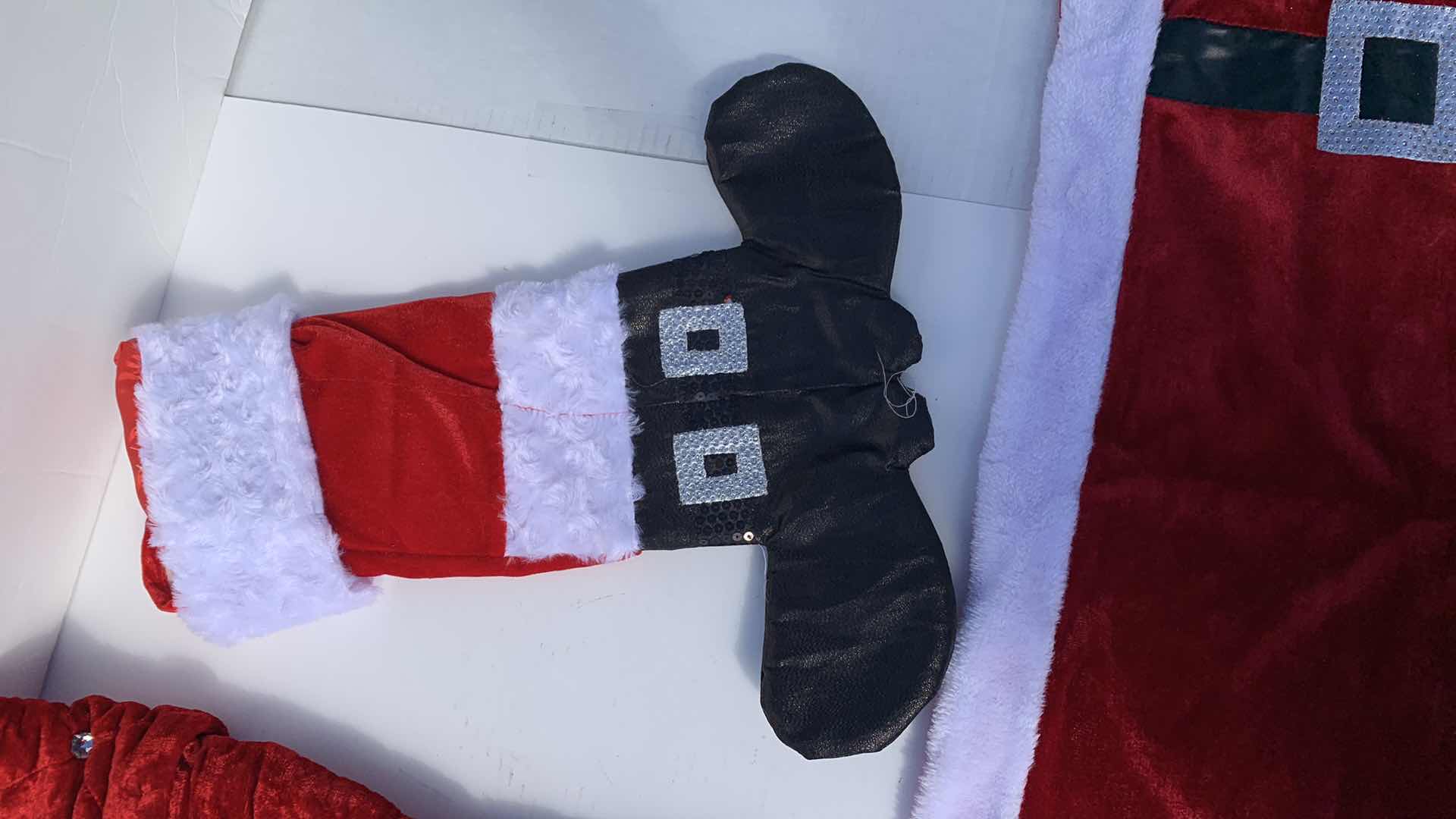 Photo 1 of CHRISTMAS DECORATIONS 2 TABLE RUNNERS, 5 QUILTED VELVET STOCKINGS, 2 SANTA BOOTS