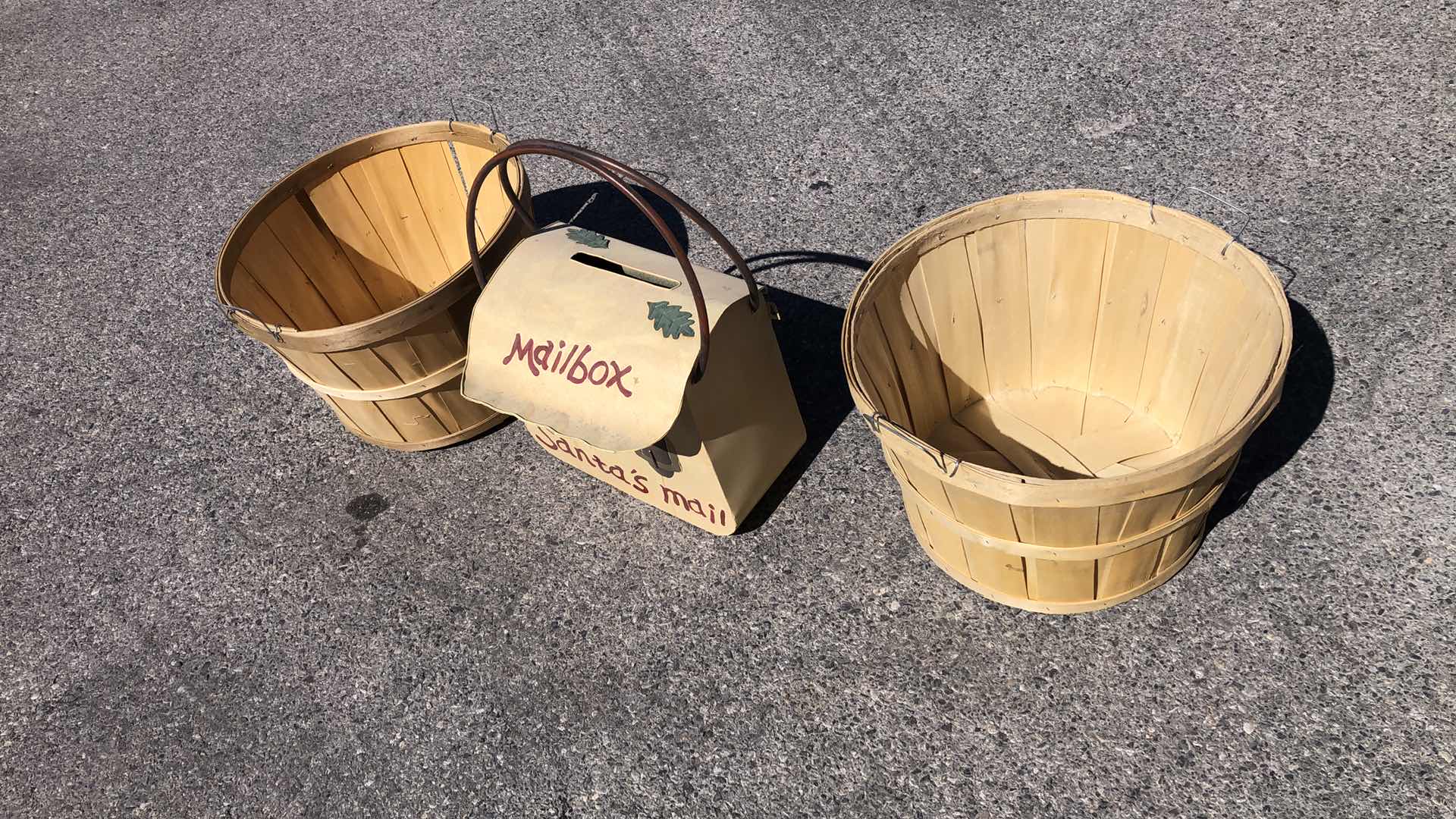 Photo 1 of 2 BUSHELL BASKETS AND A METAL SANTA’S MAILBOX