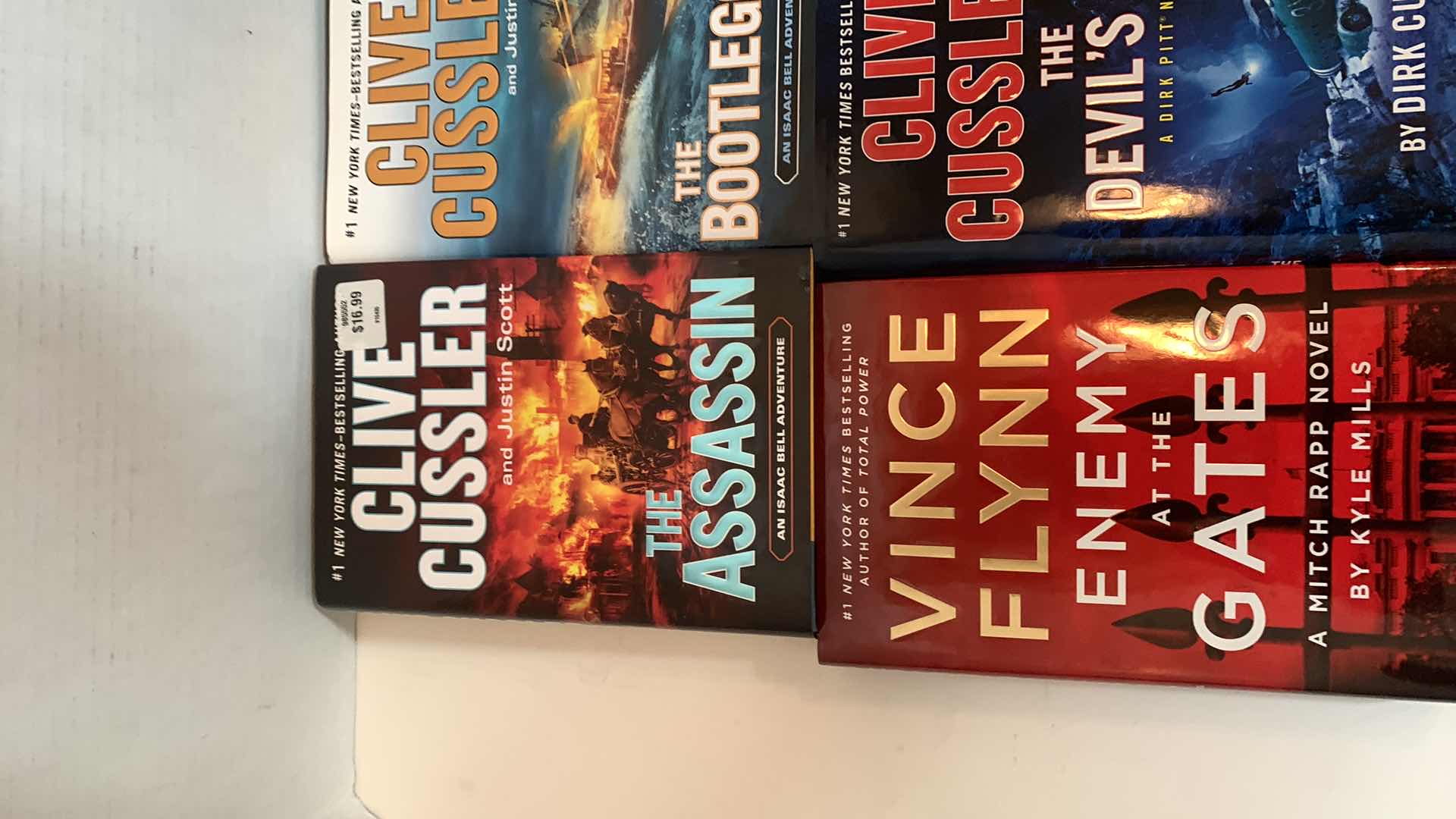 Photo 1 of 6-CLIVE CUSSLER HARD COVER BOOKS