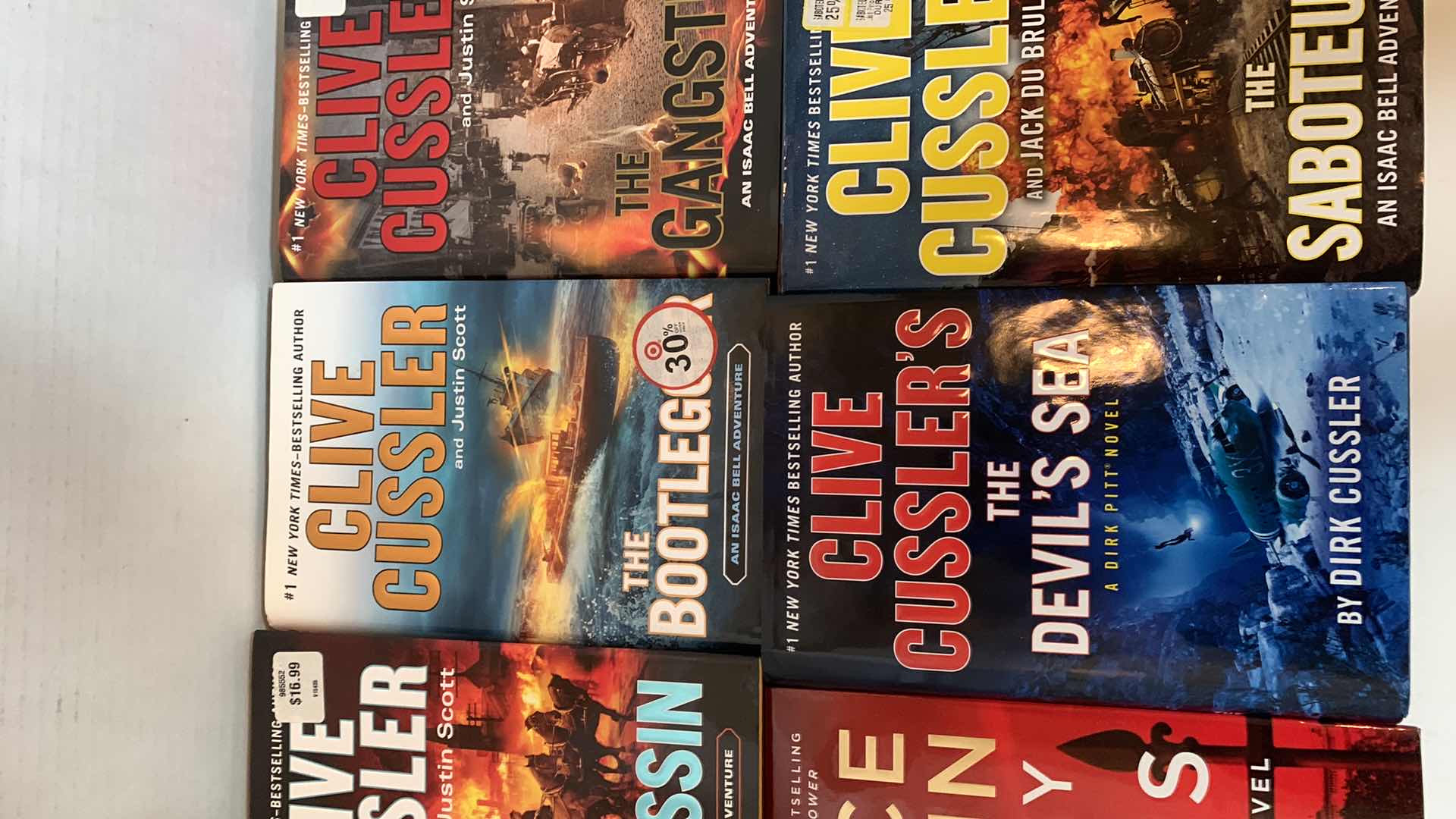 Photo 1 of 6-CLIVE CUSSLER HARD COVER BOOKS