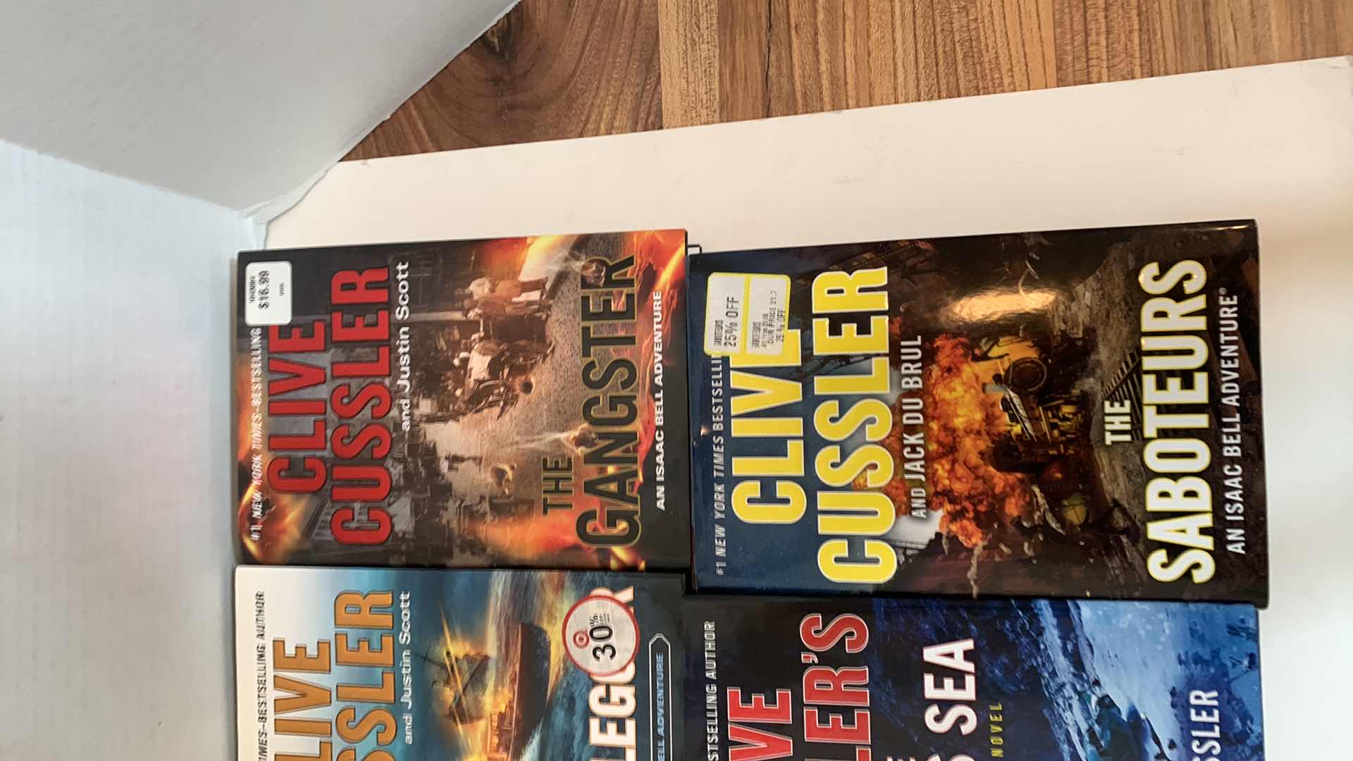 Photo 1 of 6-CLIVE CUSSLER HARD COVER BOOKS