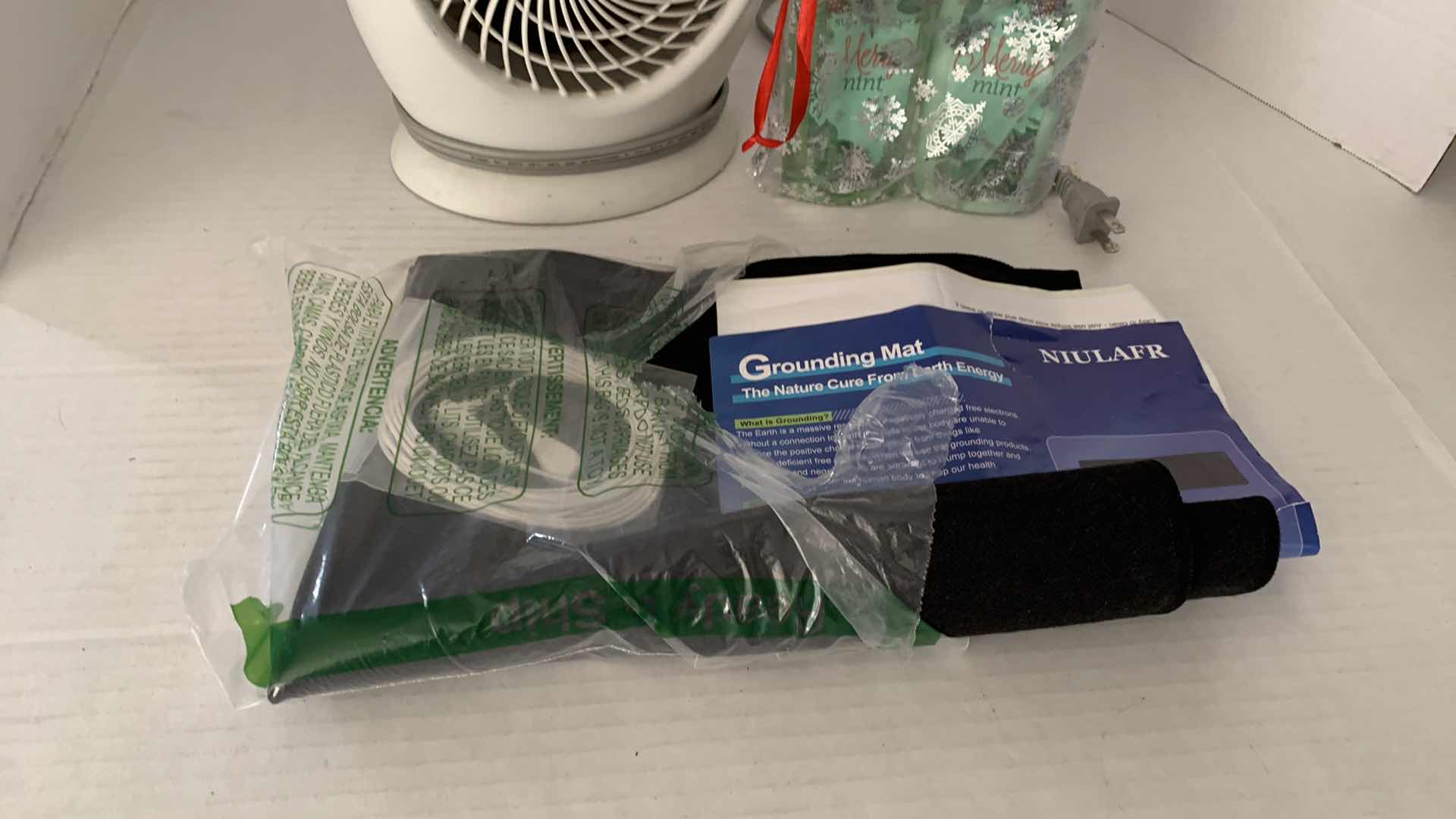 Photo 1 of HUMAN GROUNDING MAT, HOLMES HEATER, AND MERRY MINT SOAP