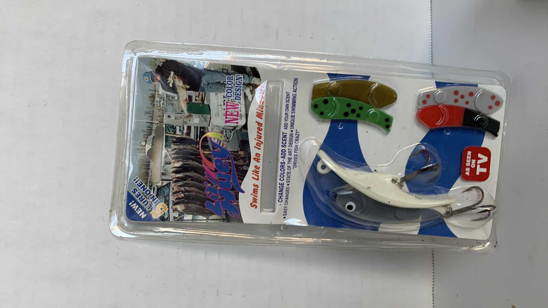 Photo 1 of VINTAGE FISHING LURE AND ZEBCO SCALE