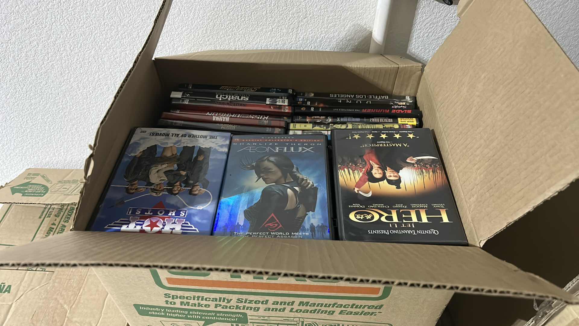 Photo 1 of CARTON FILLED WITH DVD’s