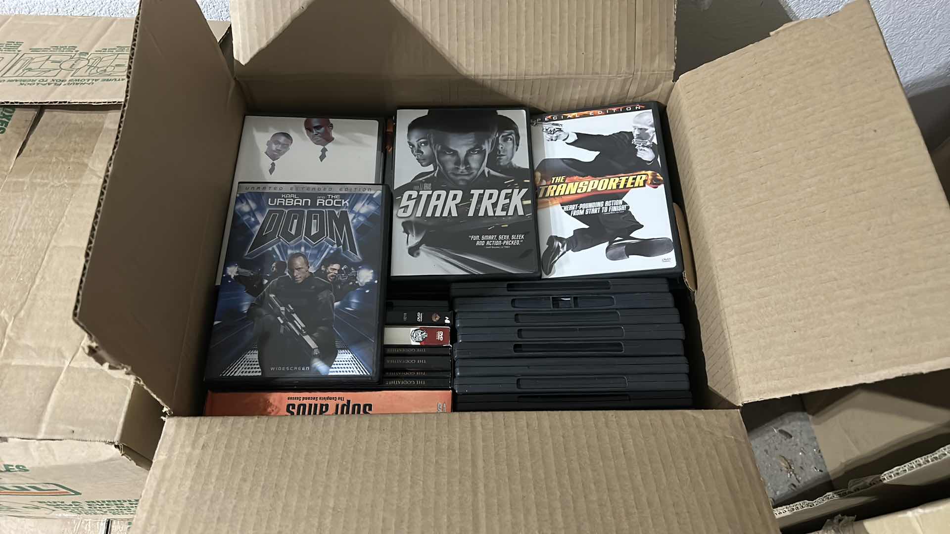 Photo 1 of CARTON FILLED WITH DVD’s