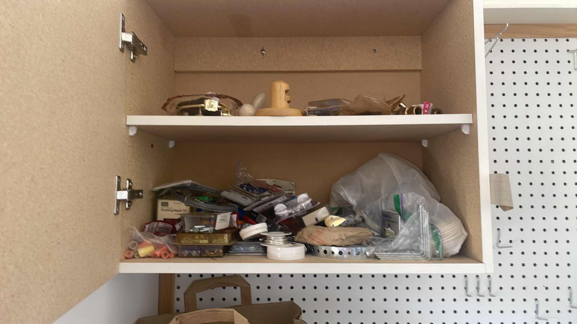 Photo 1 of CONTENTS OF CABINETS GARAGE