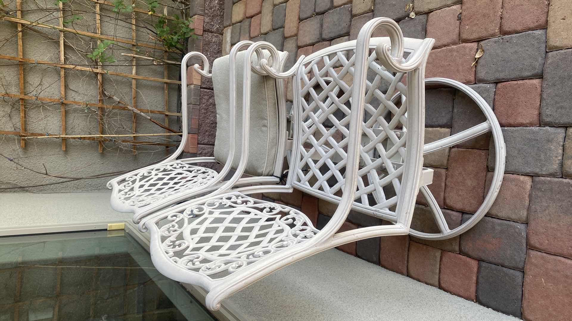 Photo 1 of 2- WROUGHT IROM SWIVEL PATIO ARM CHAIRS