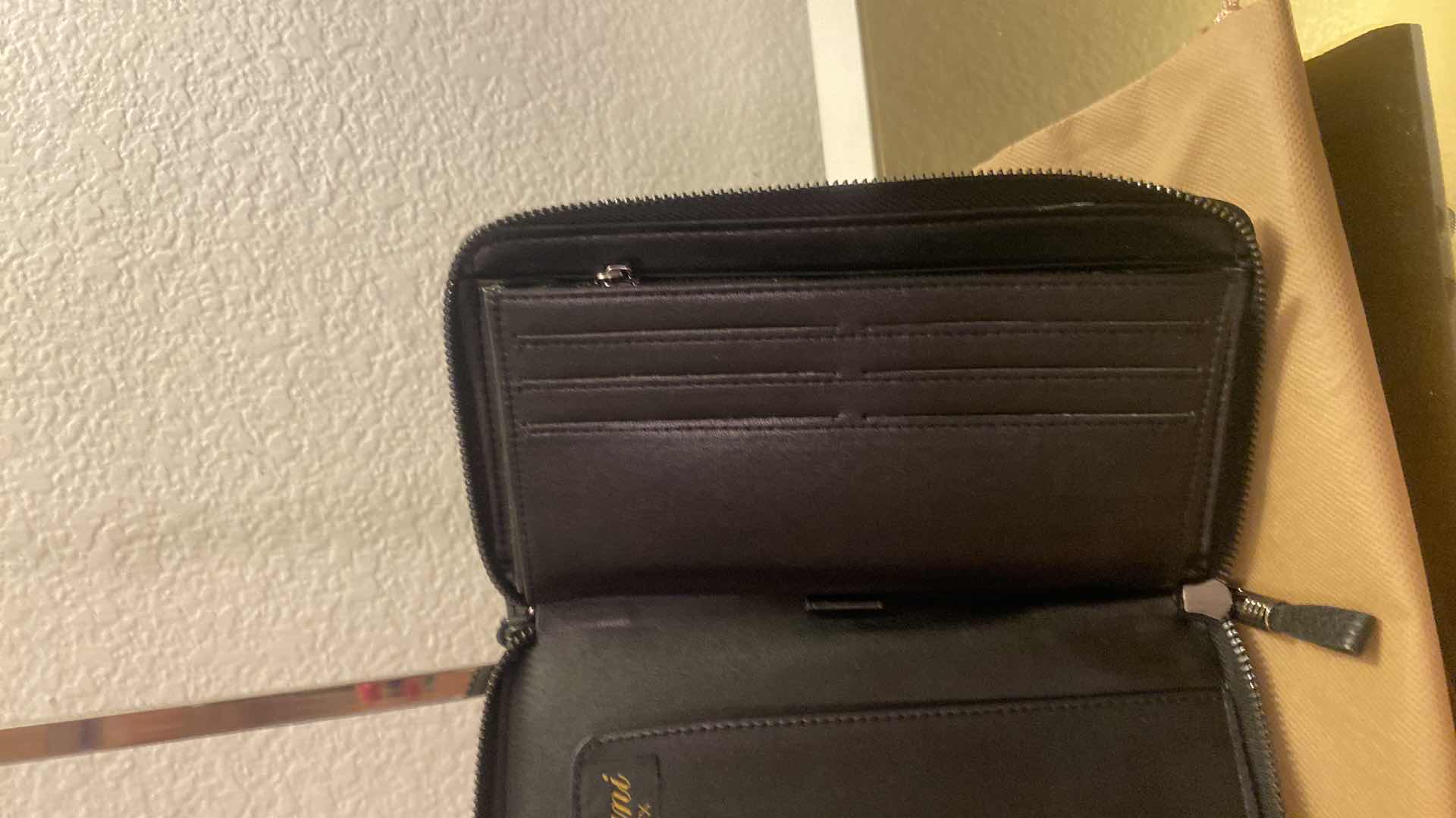 Photo 1 of  RAVIANI BLACK LEATHER WRISTLET WITH 12 CREDIT CARD SLOTS, BILL FLAP AND ZIPPER COIN POUCH  AND DUST BAG