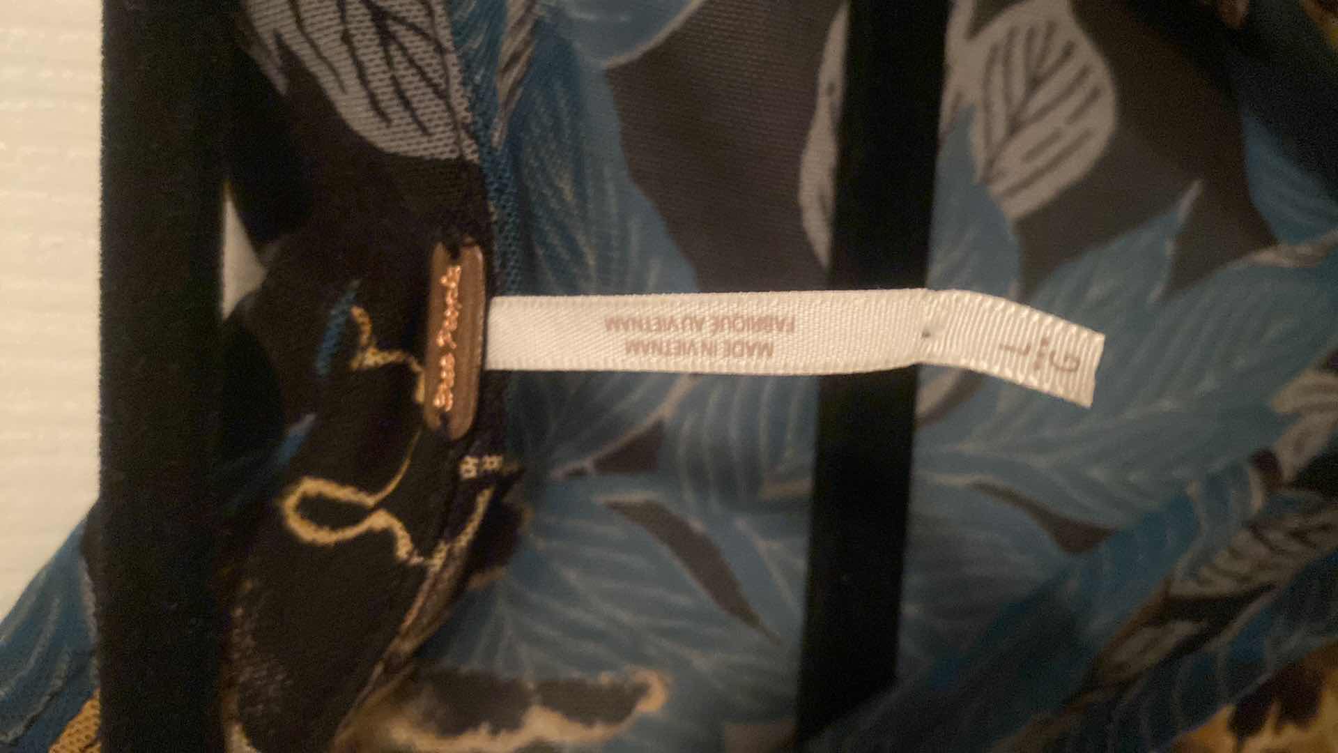 Photo 1 of LADIES SIZE LARGE FREE PEOPLE SHIRT